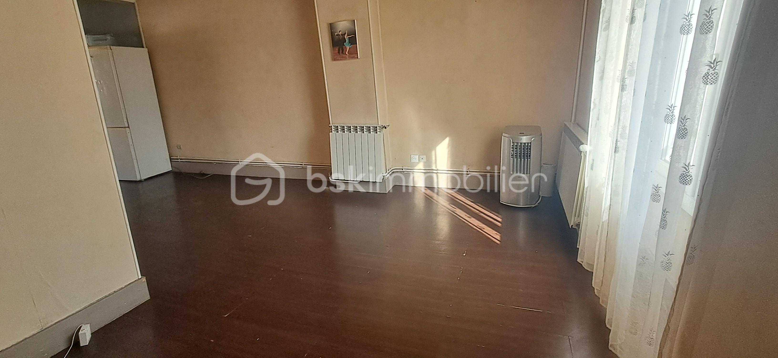 Appartement de 65 m² - Appartement Rives Republique 43 Chambre Salon 1.jpg