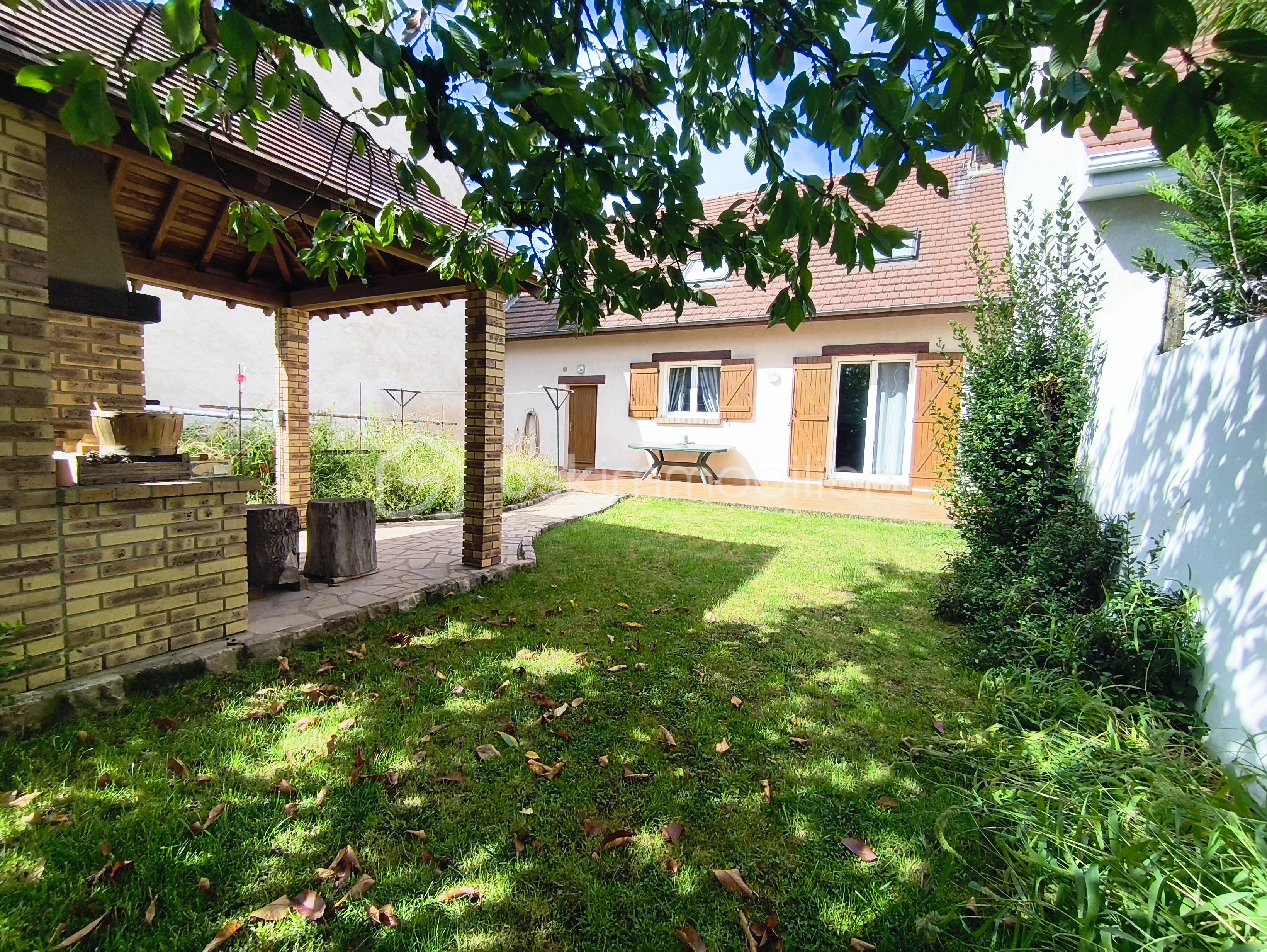 Maison de 135 m² - Jardin arrière.jpg