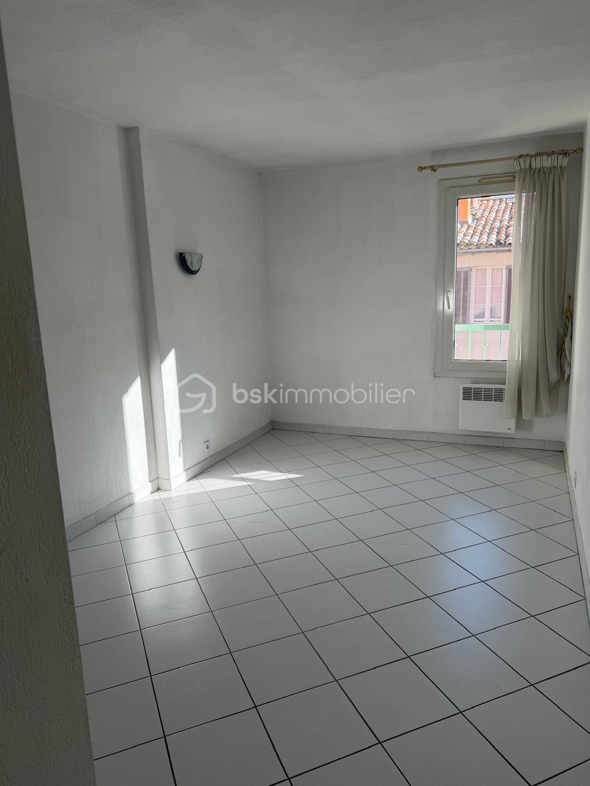 Appartement de 62,44 m² - WhatsApp Ima.jpeg