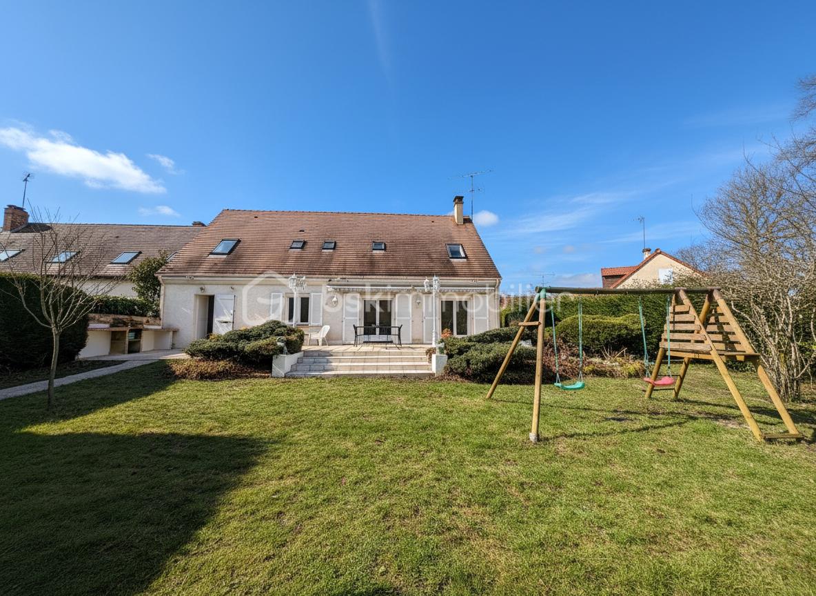 Maison traditionnelle de 150 m² - maiosn-dos.jpg