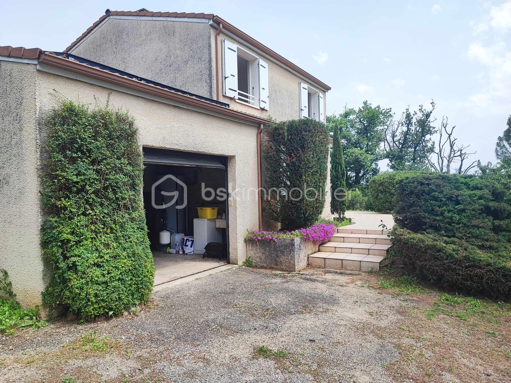 Maison de 107 m² - maison de coté garage ouvert.jpg