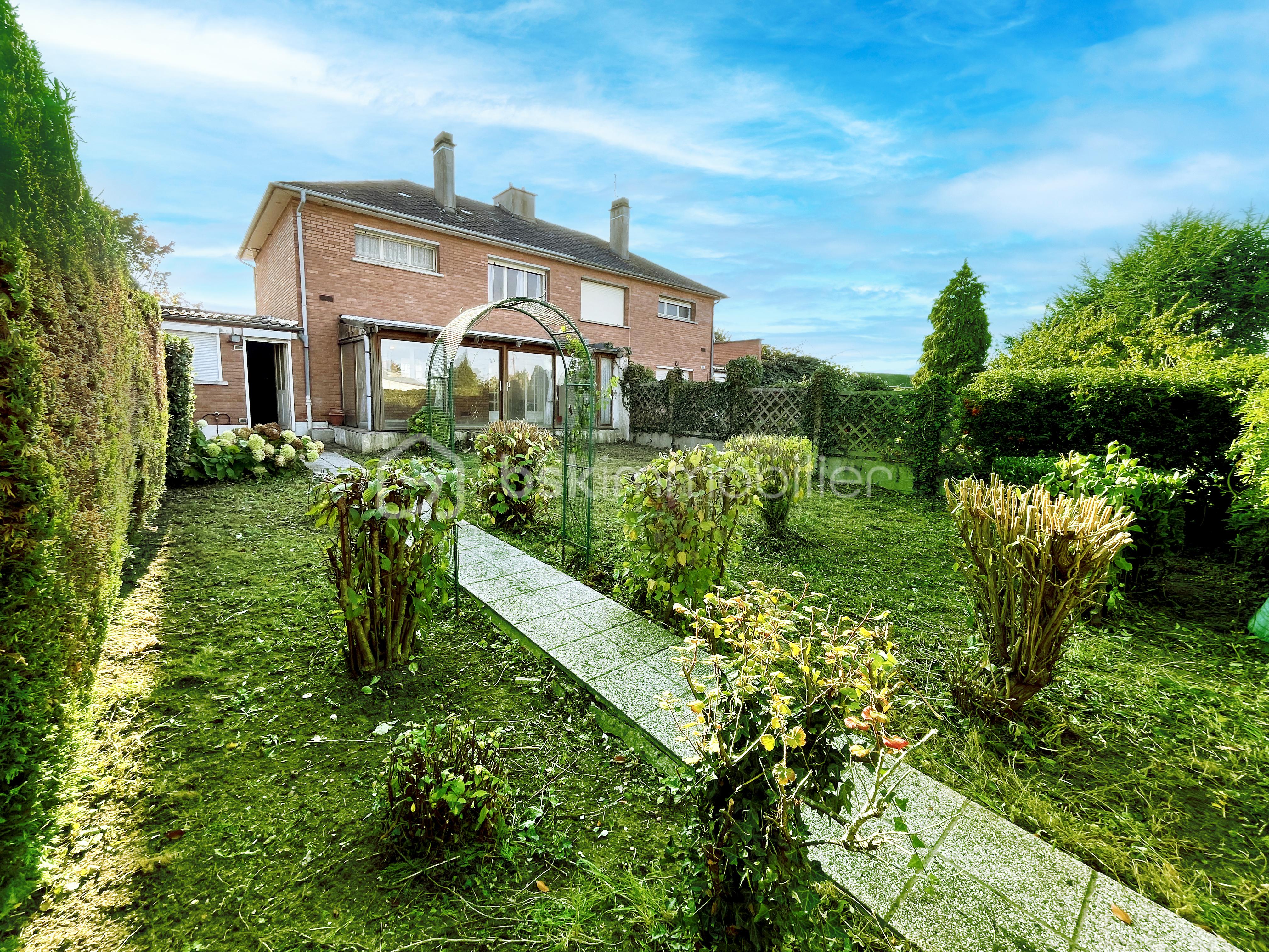 Maison de 88,20 m² - Jardin 01.jpg