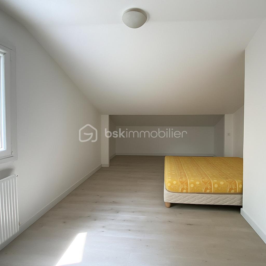 Maison de 133 m² - chambre  5 lit jaune.png