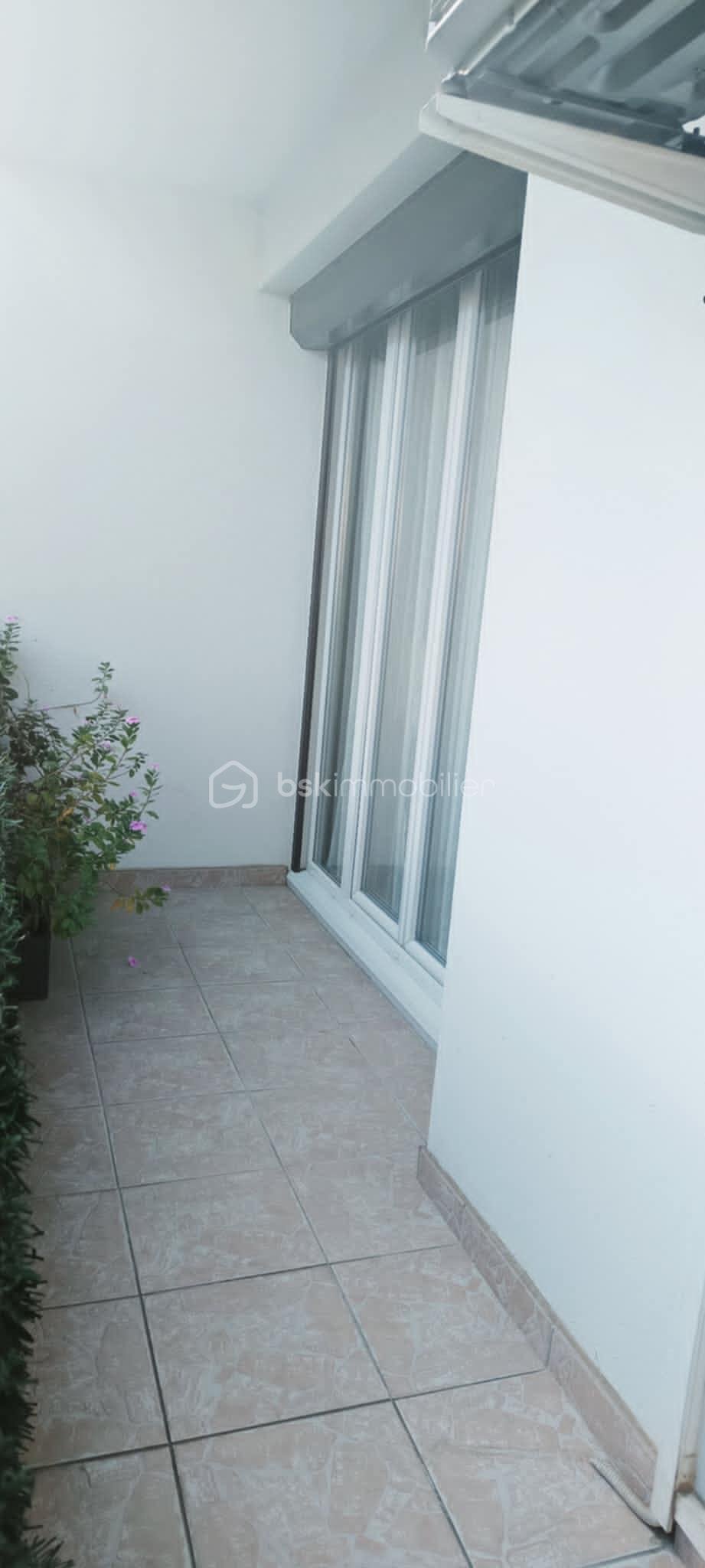 Appartement de 70,71 m² - download.jpg