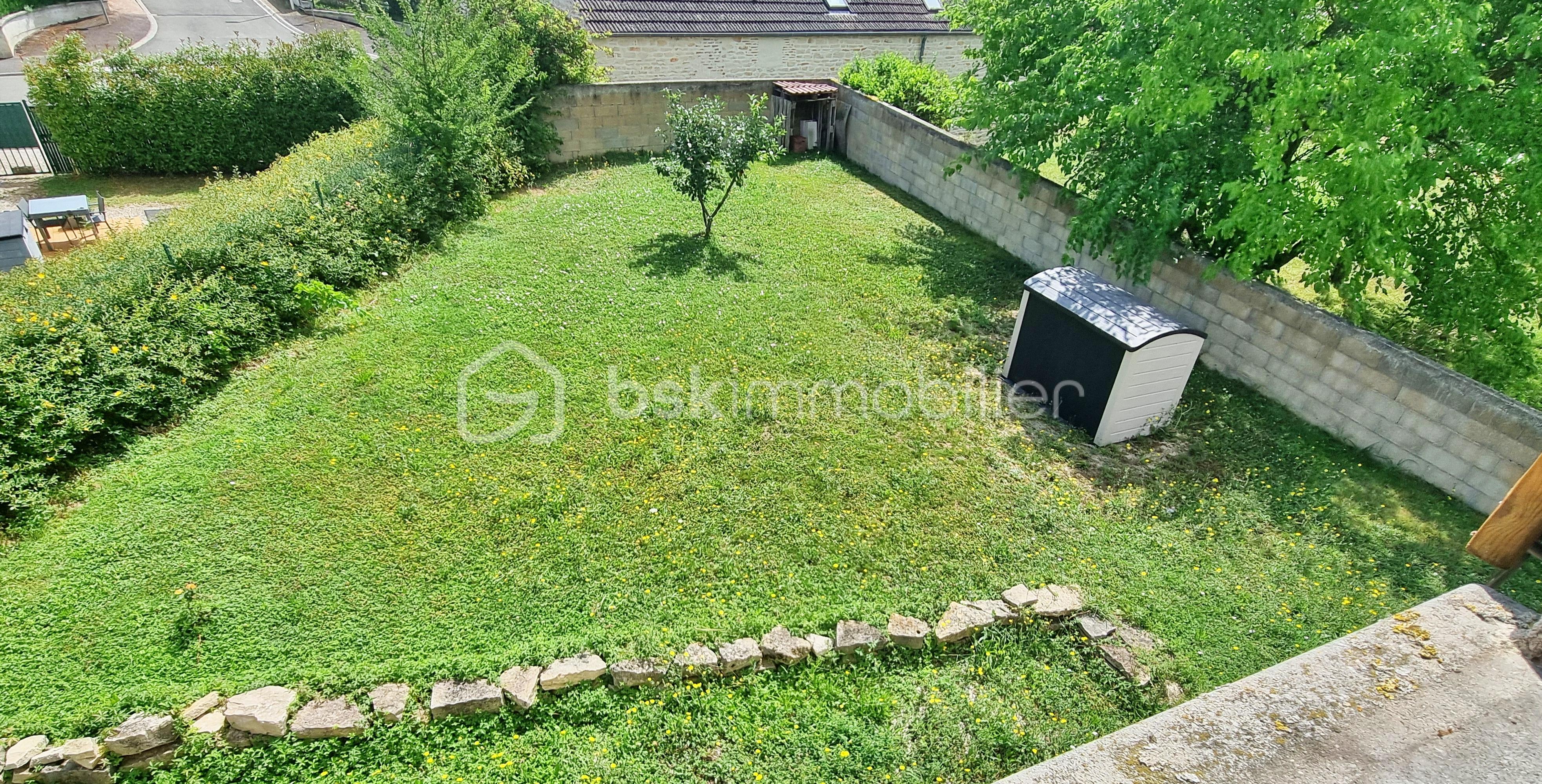 Maison de 106 m² - terrain.jpg