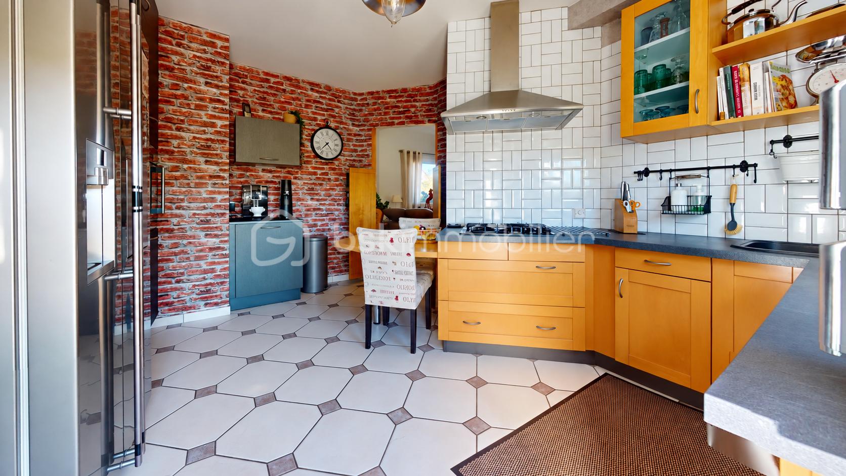 Cuisine moderne chaleureuse et impeccable.png