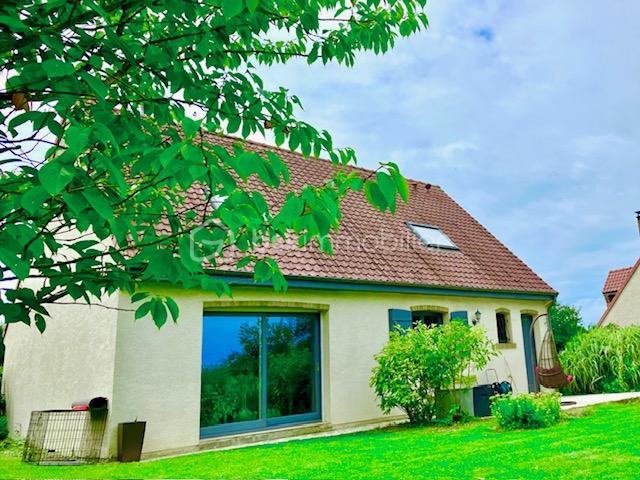 Maison de 108 m² - dalle façade arrière.jpg