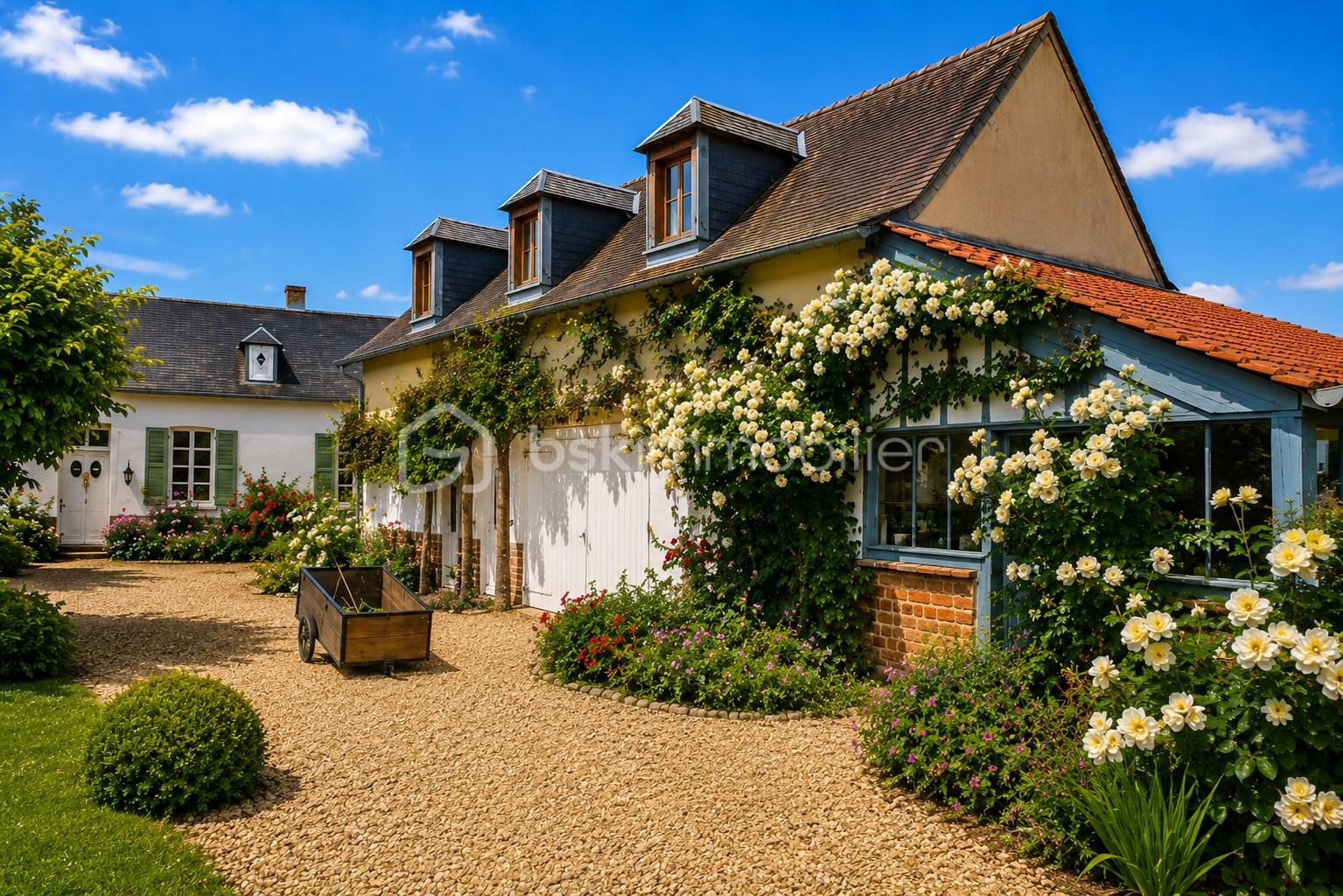 9 LE BOTTIN IMMOBILIER façade fleurie dep .jpg