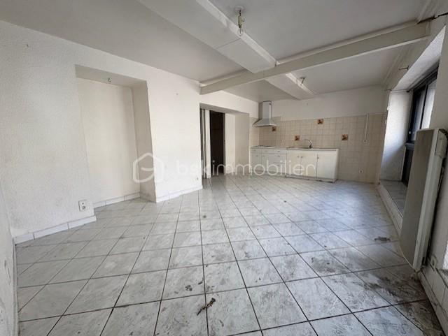 Immeuble mixte de 130 m² - PIECE PRINCIPE IZARD RDC.jpg