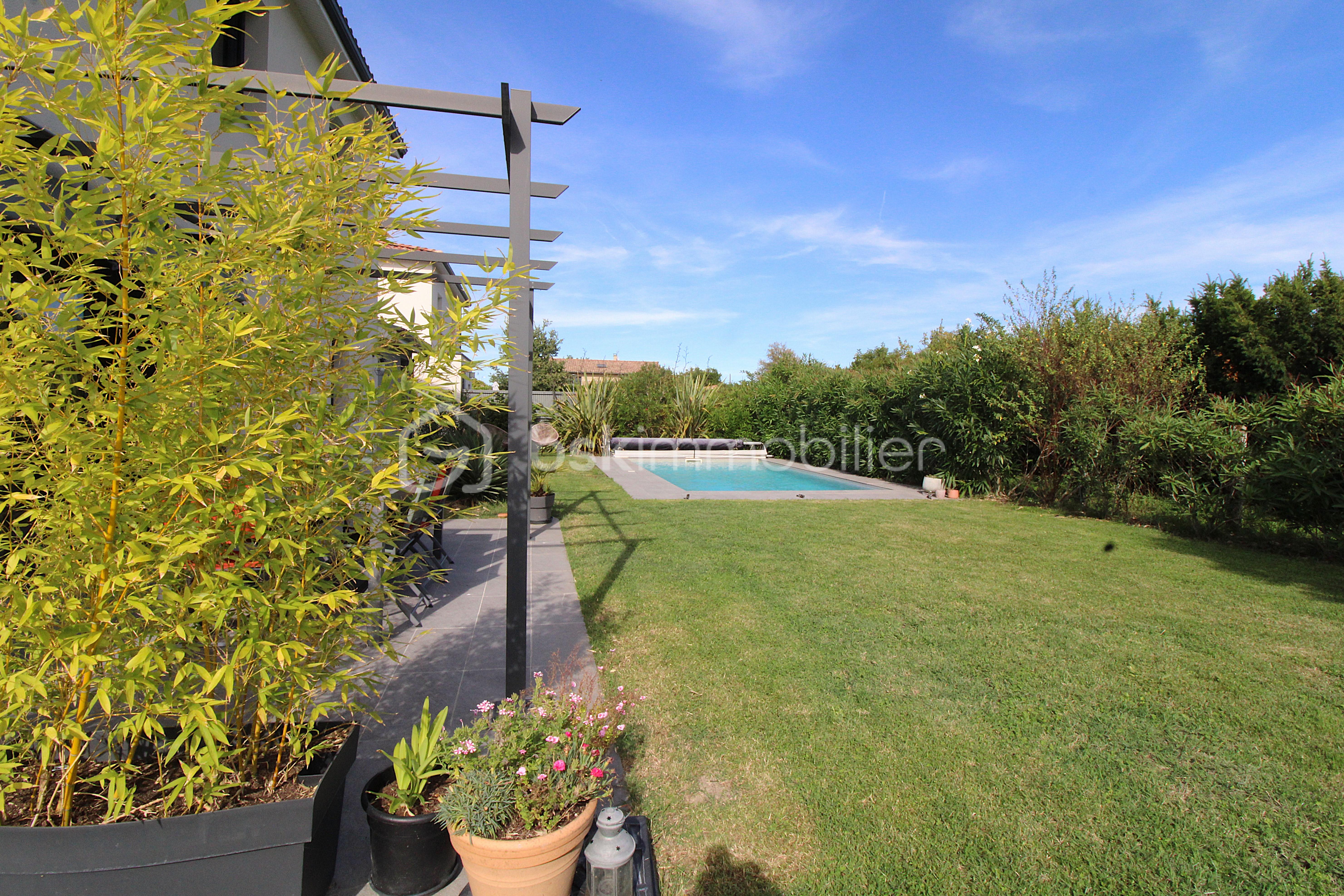 Maison de 144 m² - LEMESLS_IMMOBILIER_VENTE_MAISON_CASTELAMUROU_TYPE5_EXTERIEUR_PISCINE1.JPG