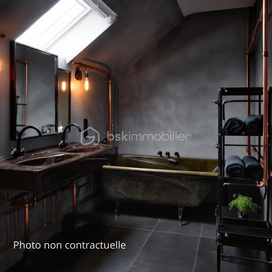 Photo non contractuelle salle de bain.png