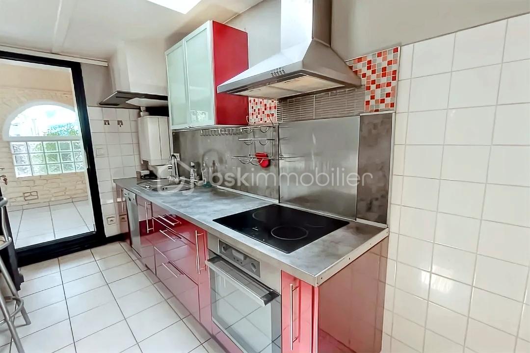 Maison de 98 m² - hoqi-1aaa241ee4ab4d2fb490e9620c4fd7bc.jpg