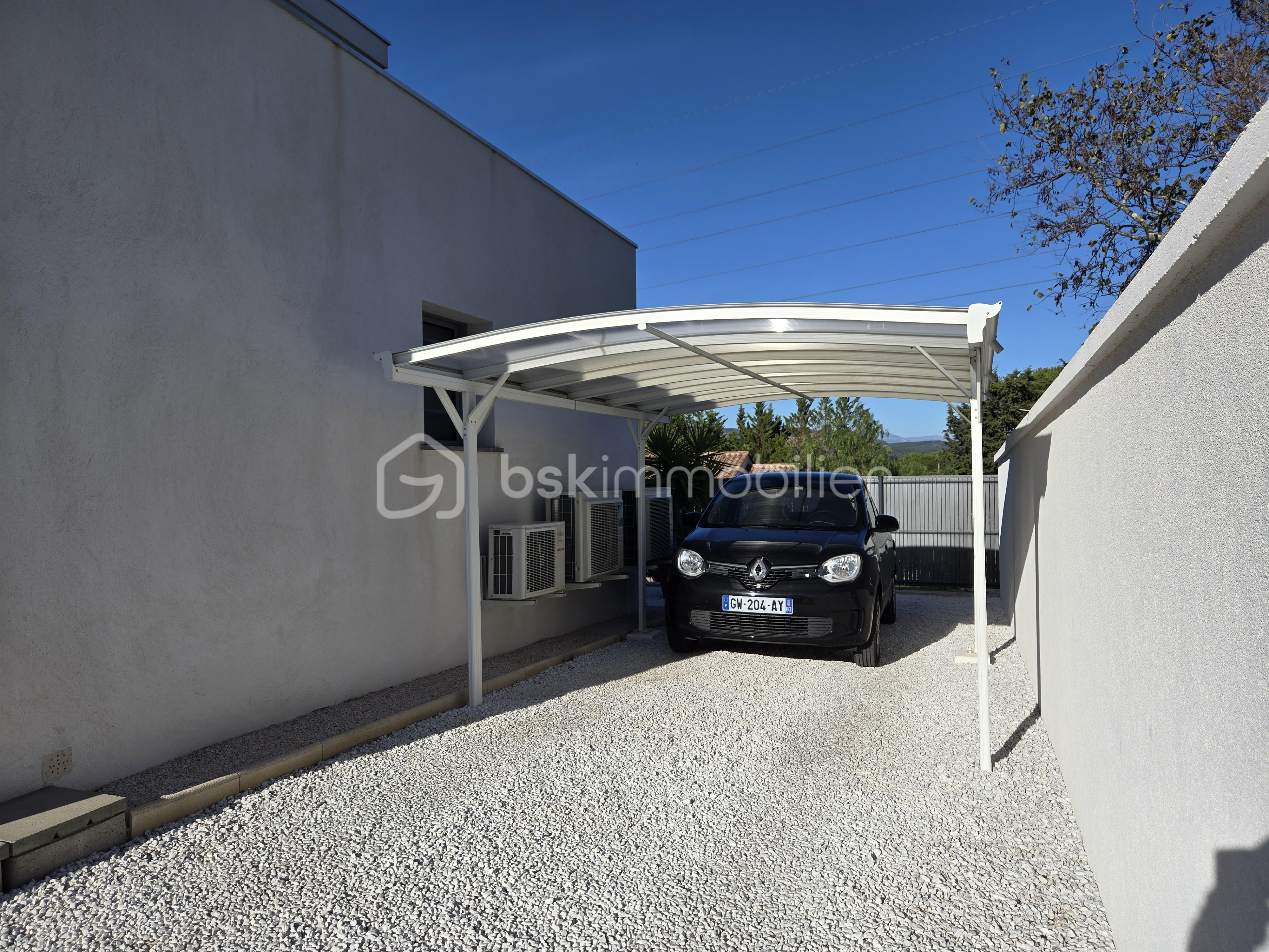 Maison contemporaine de 131 m² - car port.jpg