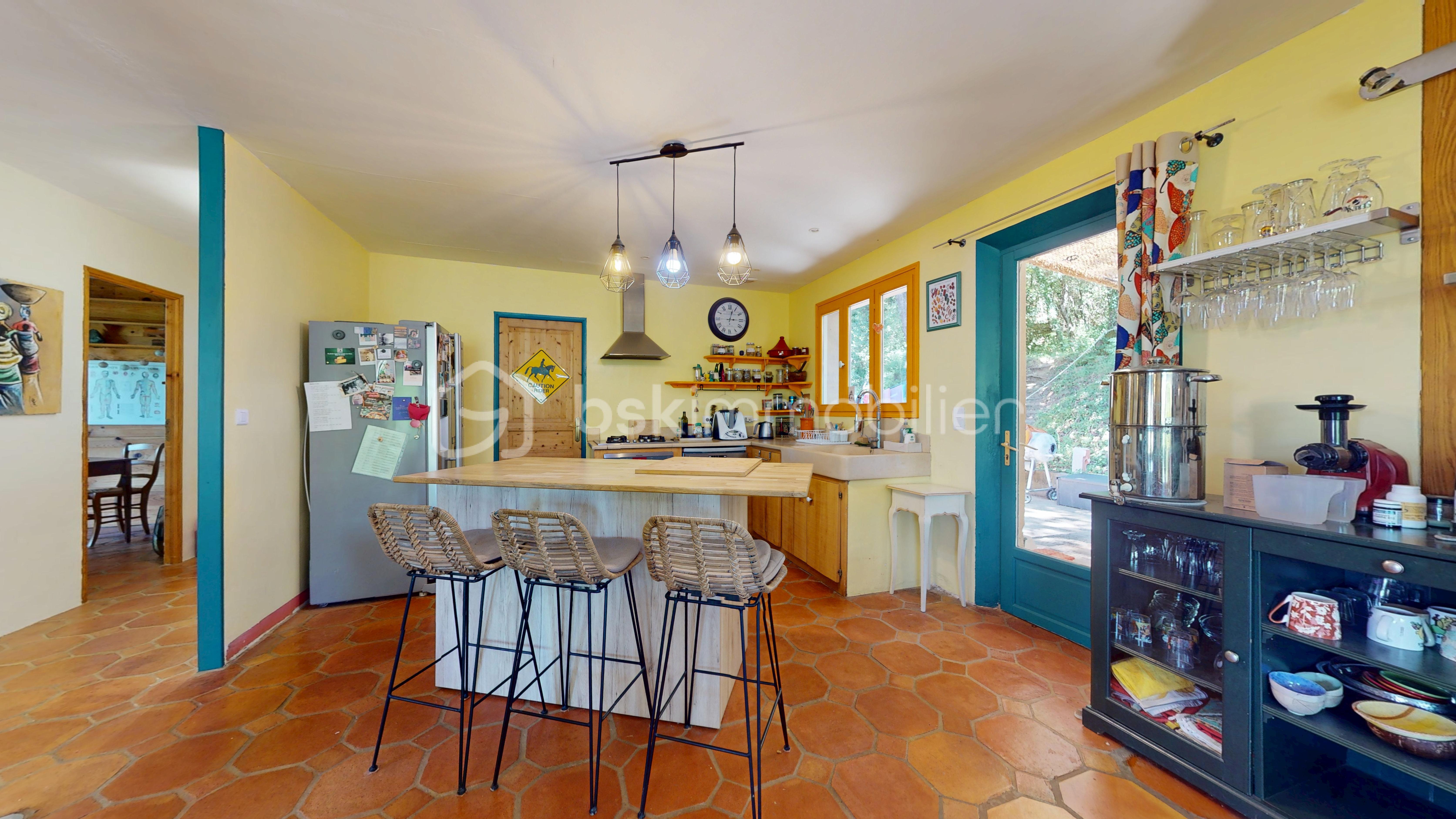 Maison traditionnelle de 136,60 m² - Maison_nature_plain_pied_T5_30630 5.jpg