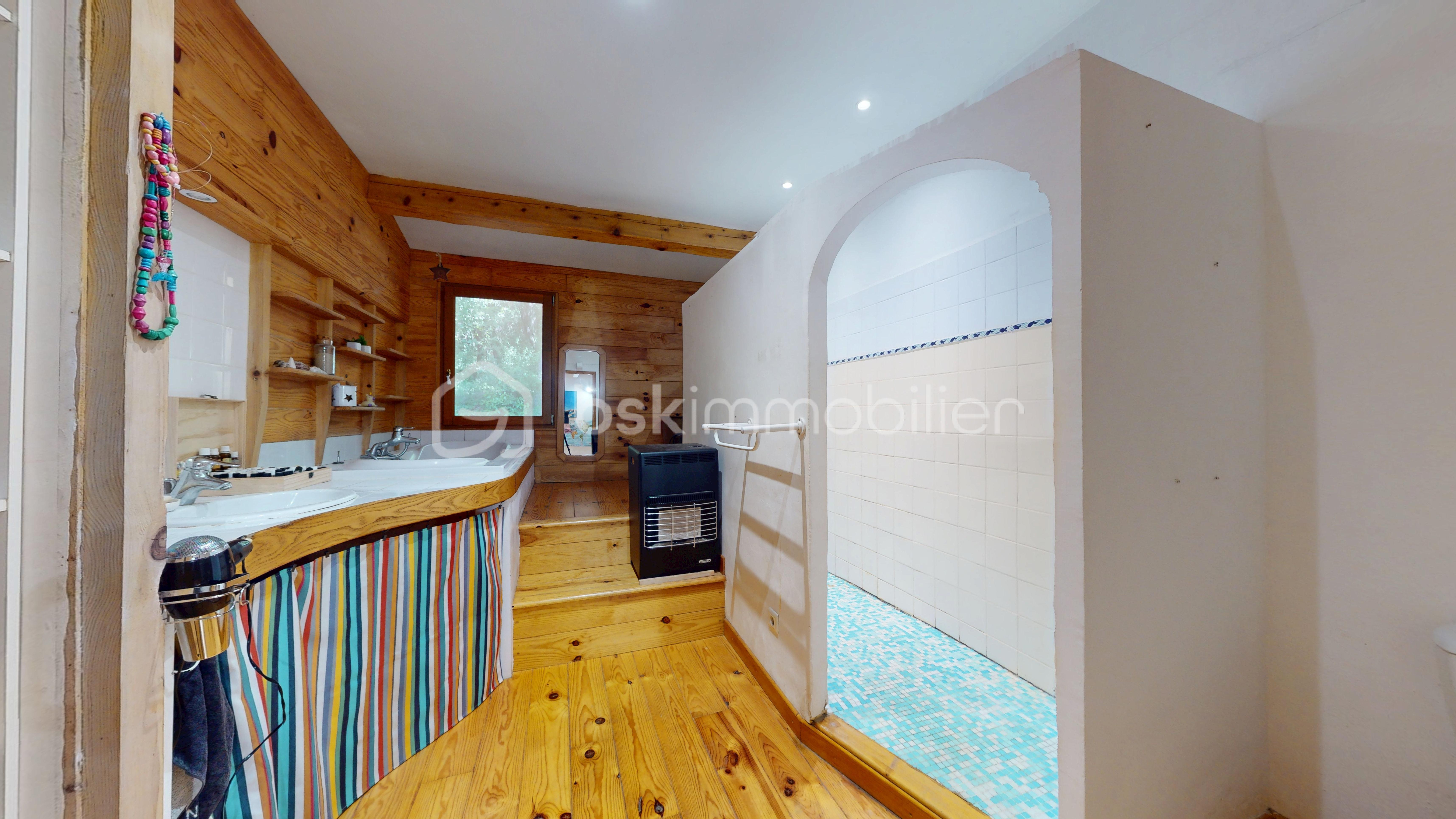 Maison traditionnelle de 136,60 m² - Maison_nature_plain_pied_T5_30630 18.jpg