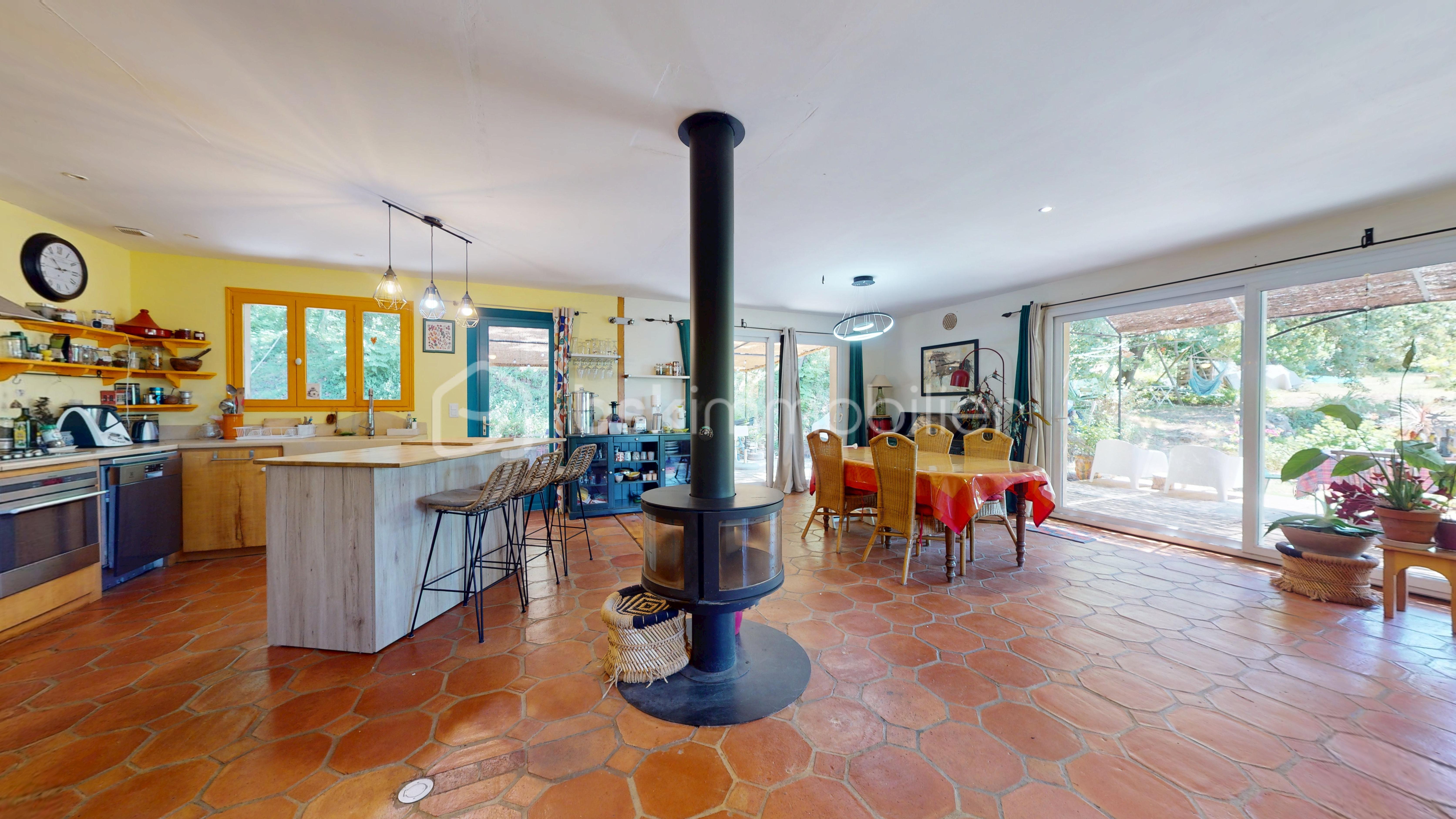 Maison traditionnelle de 136,60 m² - Maison_nature_plain_pied_T5_30630 1.jpg