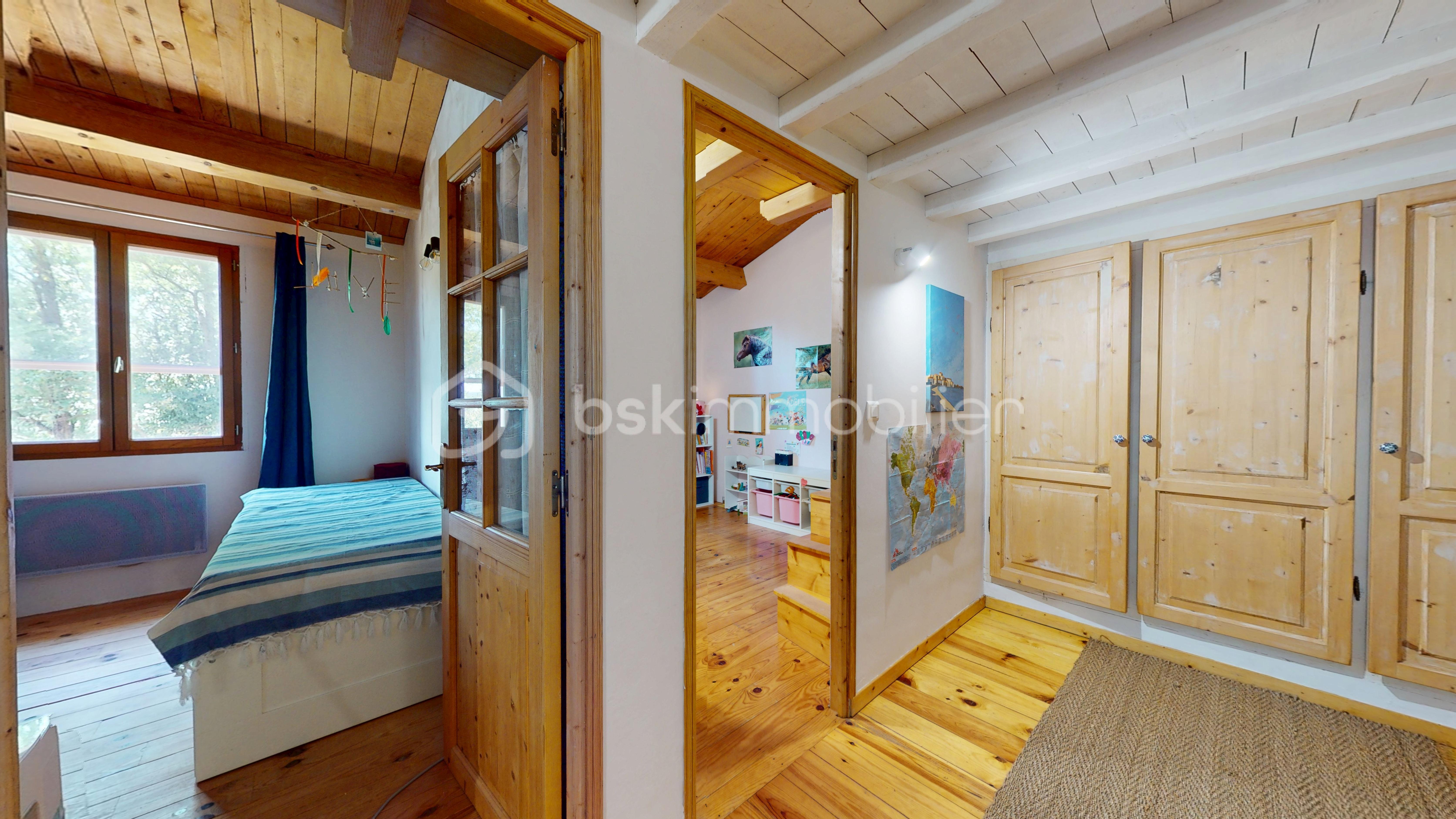 Maison traditionnelle de 136,60 m² - Maison_nature_plain_pied_T5_30630 8.jpg