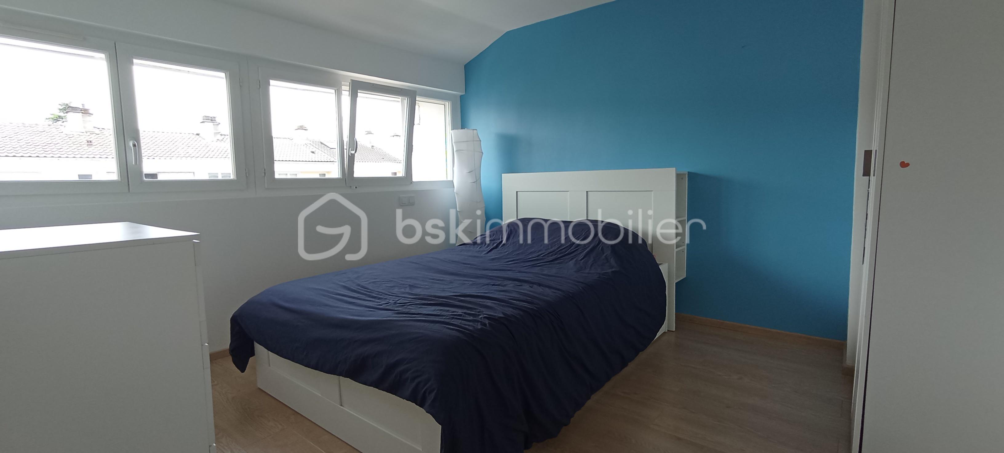 Maison de 100 m² - CHAMBRE 2 (2).jpg
