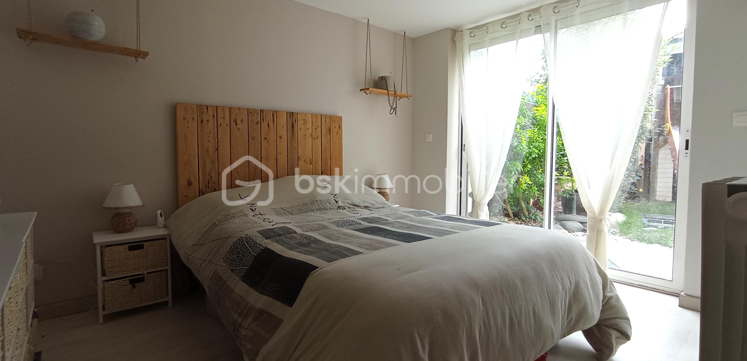 Maison de 100 m² - CHAMBRE RDC (1).jpg
