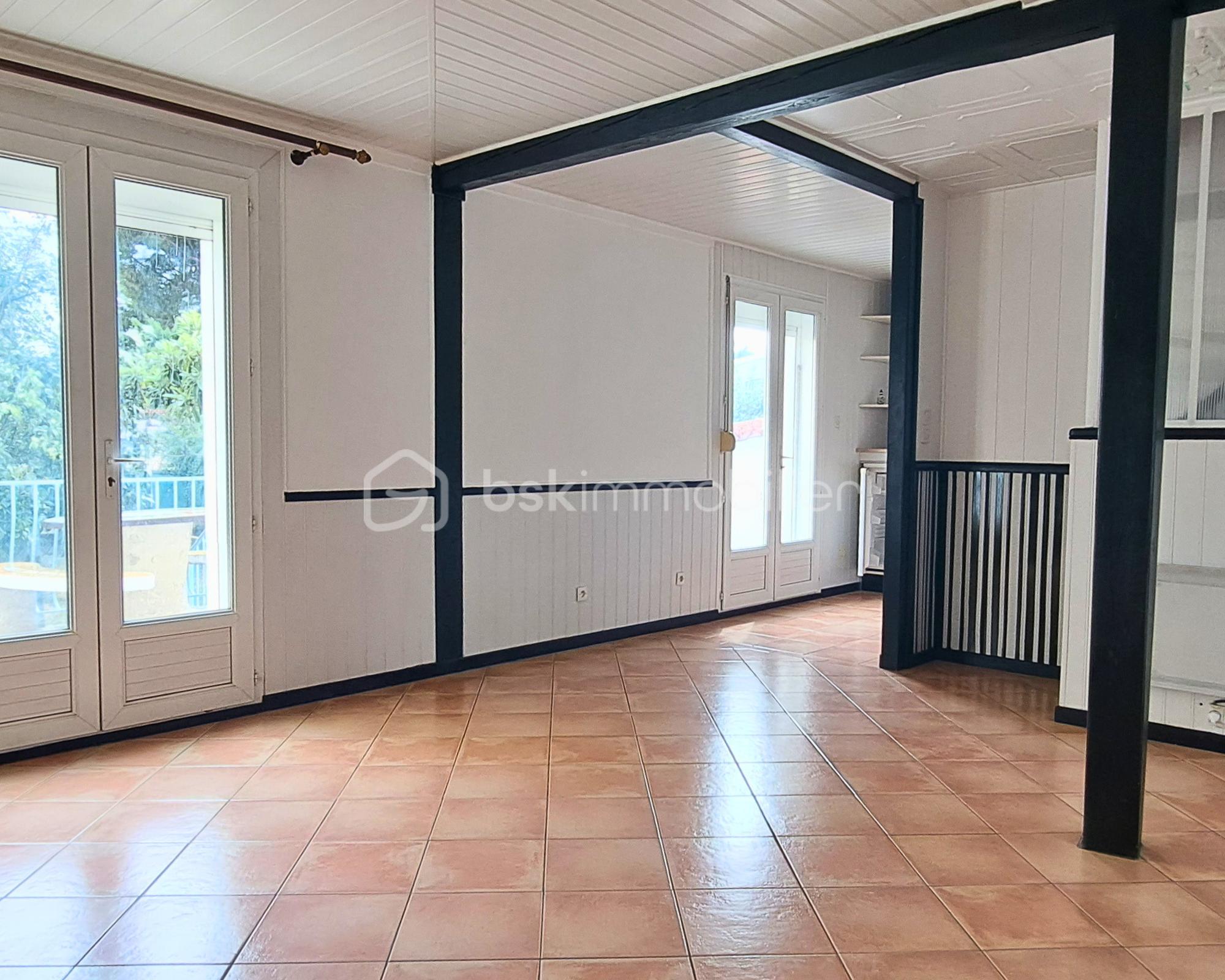 Maison de 58 m² - Salon-terrasse.png