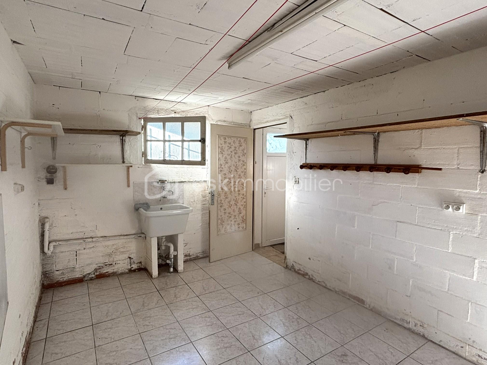 Maison traditionnelle de 175 m² - buanderie.JPEG