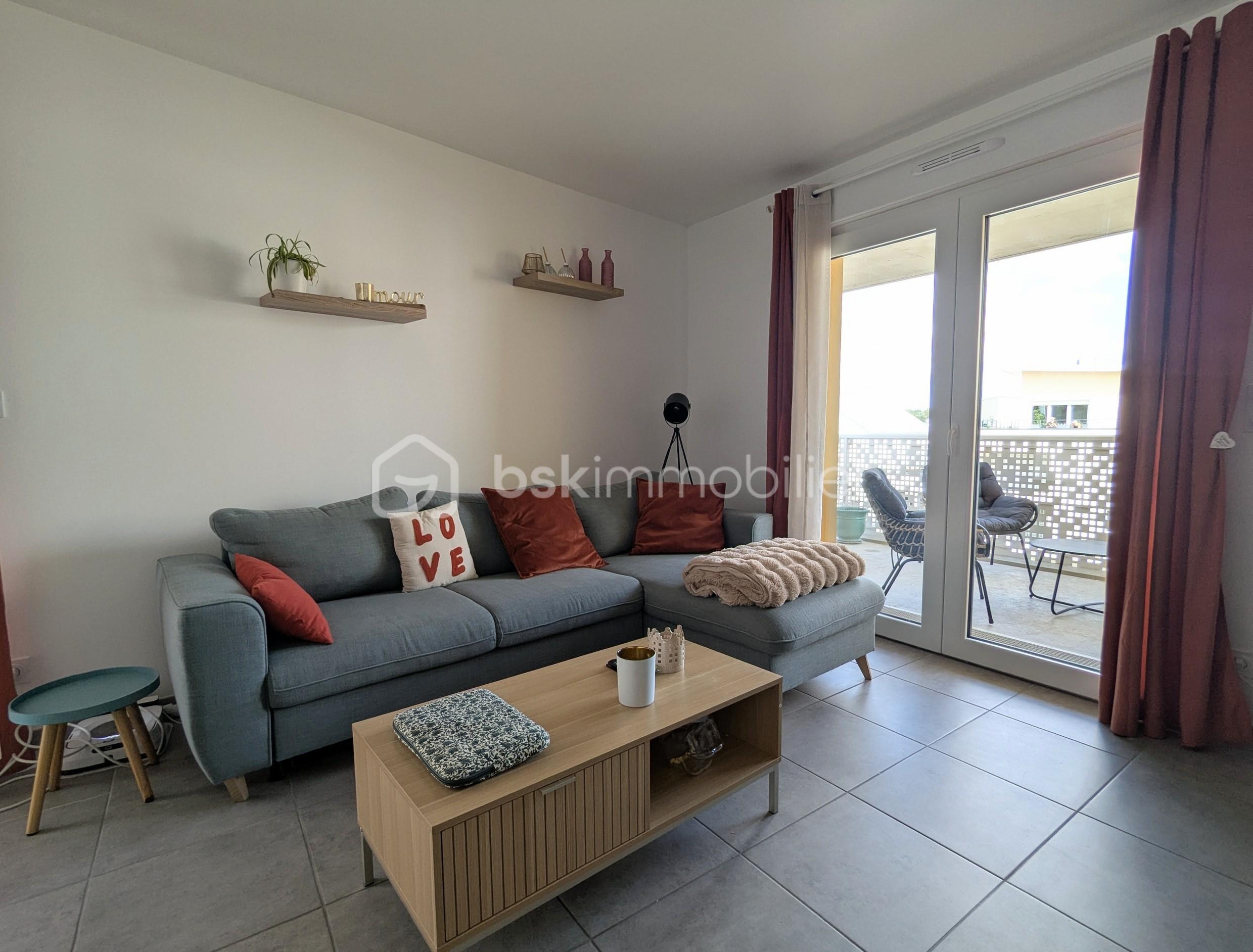 Appartement de 78,05 m² - salon epron.jpg
