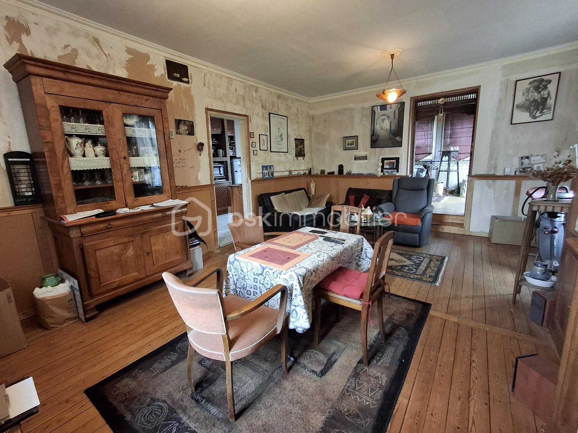 Maison de 115 m² - Pièce à vivre paysage vers véranda.jpg