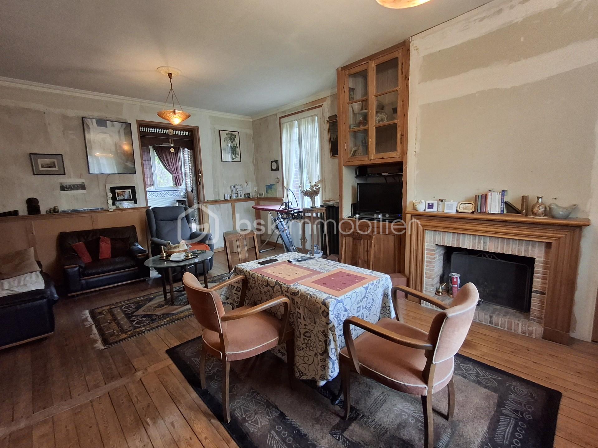 Maison de 115 m² - Pièce de vie paysage vers cheminée 2.jpg