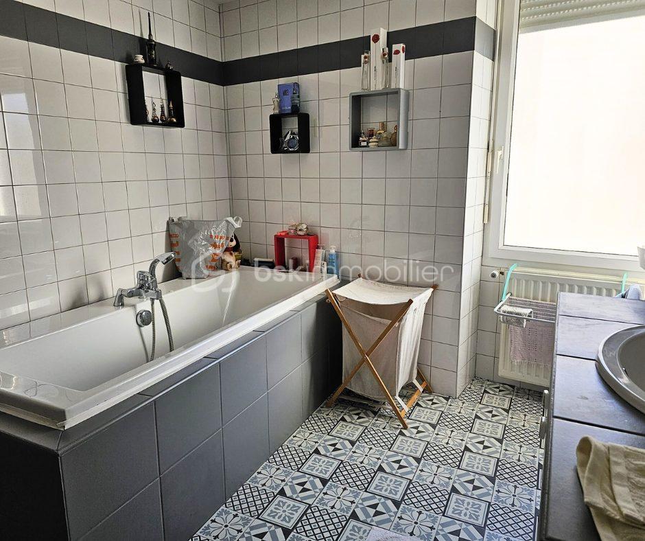 Maison de 100 m² - photo_ee3c7d20f3c1d5f986ee809b607513cc.jpg