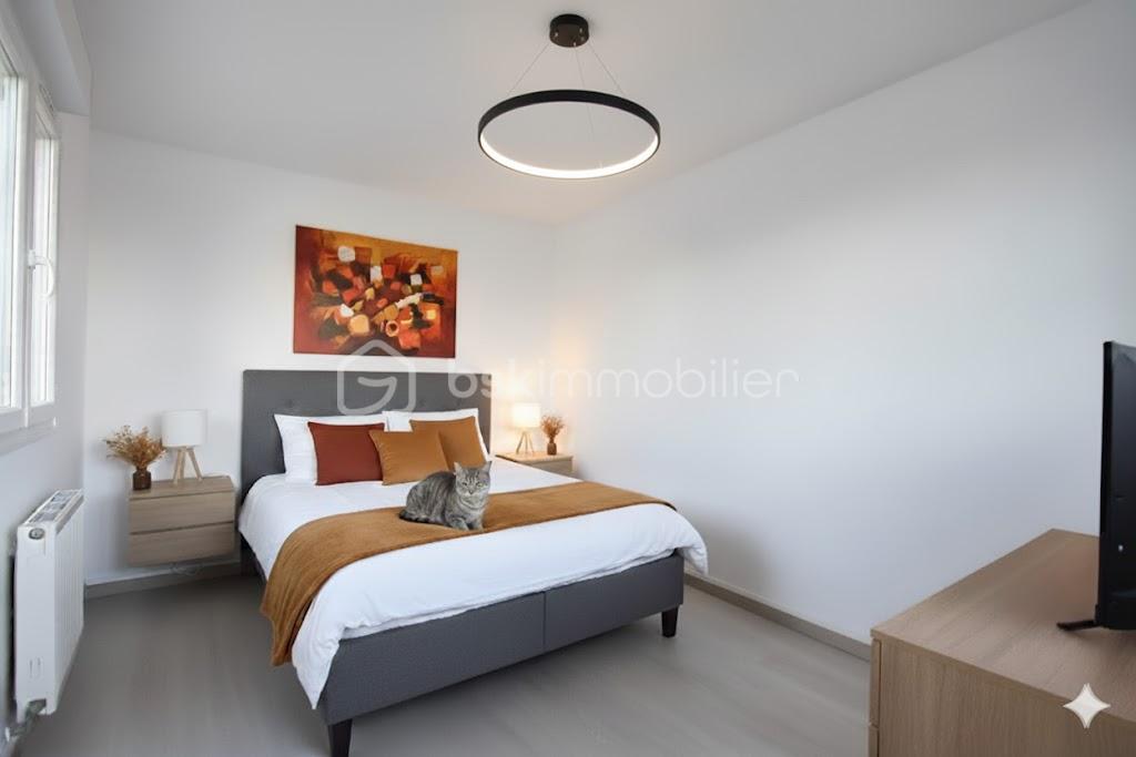 Appartement de 55,35 m² - salon ia6.jpg
