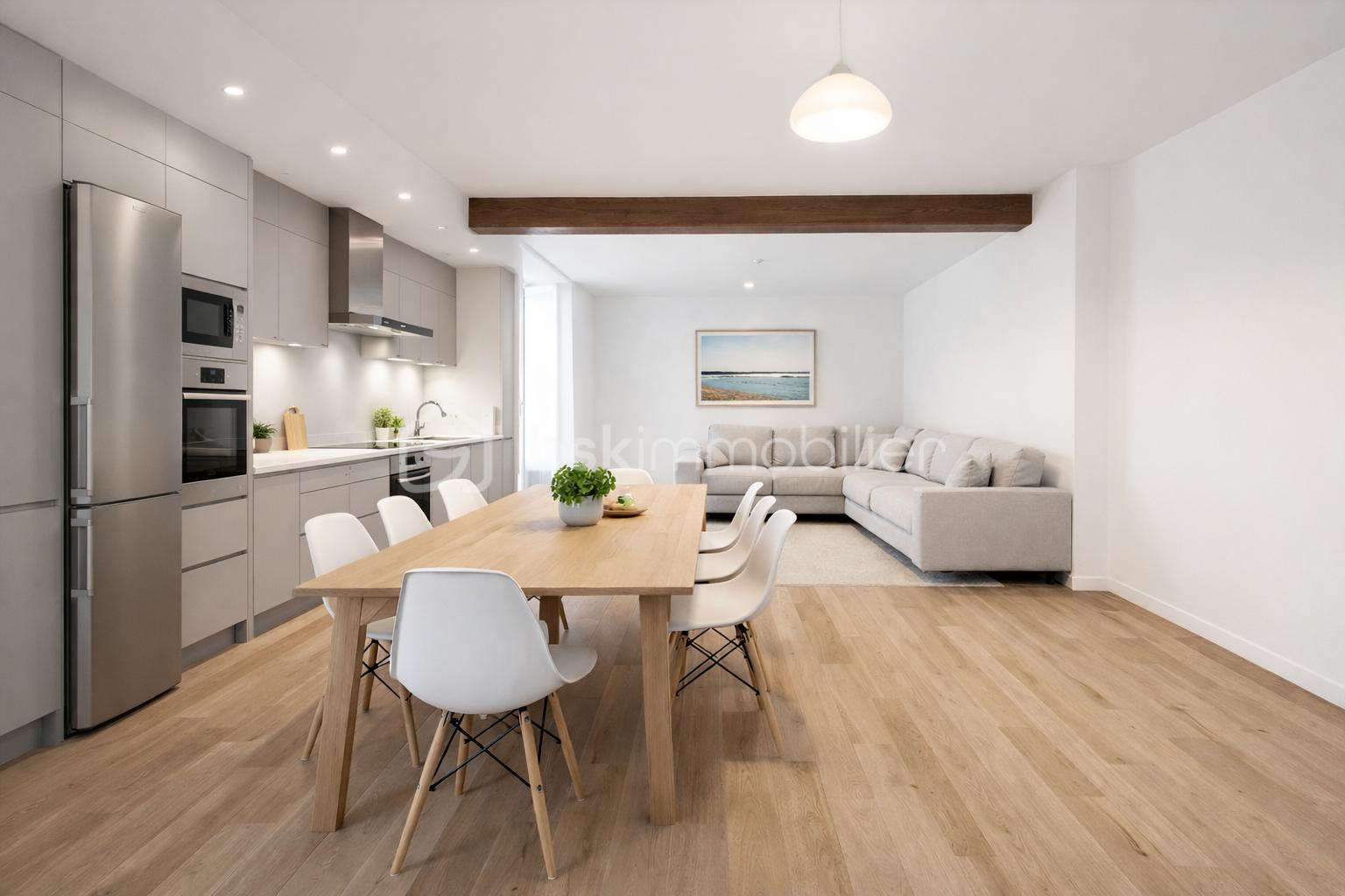 Maison de ville de 78 m² - Salon et cuisine moderne ouverte.png