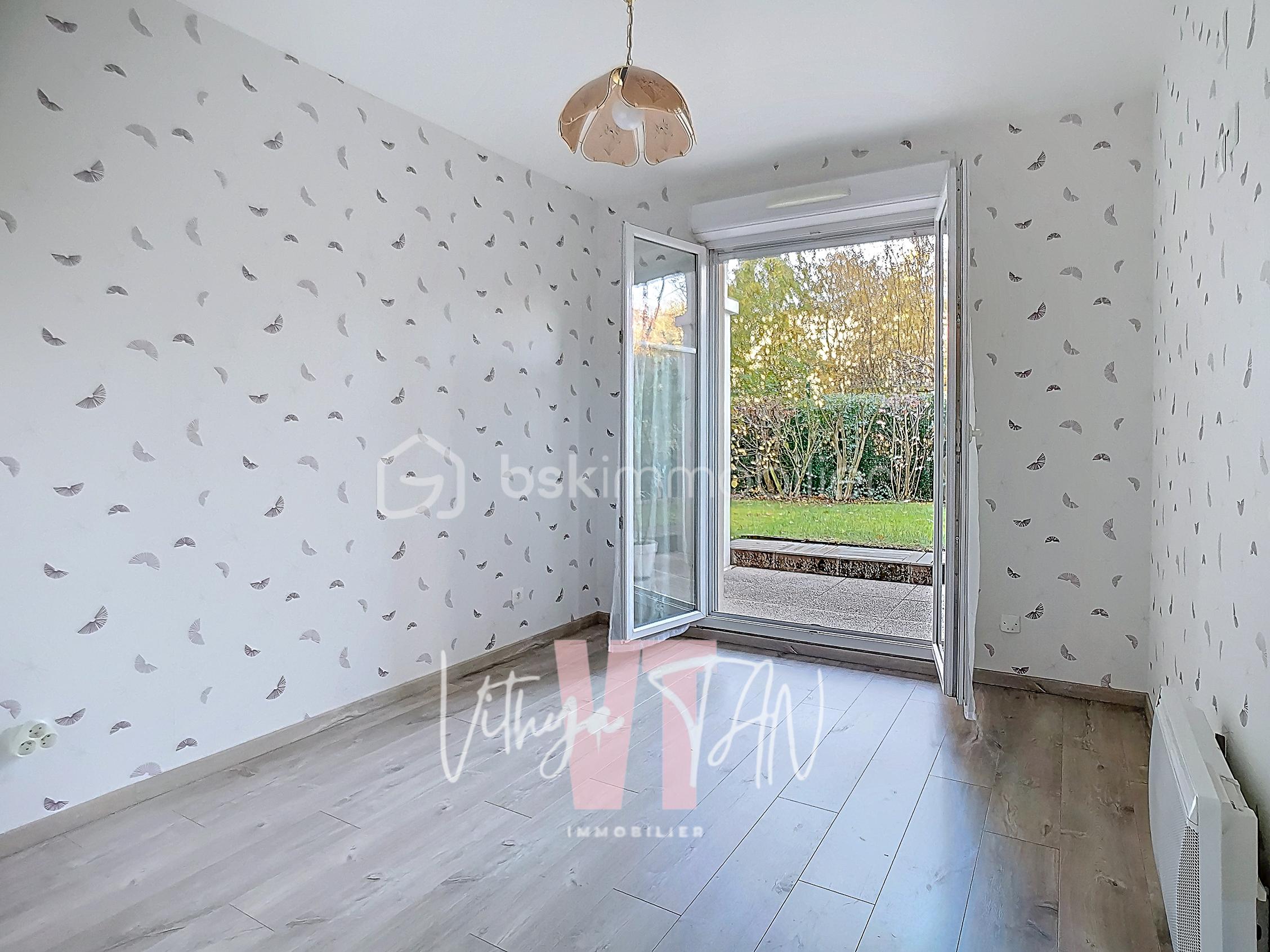Appartement de 61 m² - 13 CHAMBRE 1.jpg