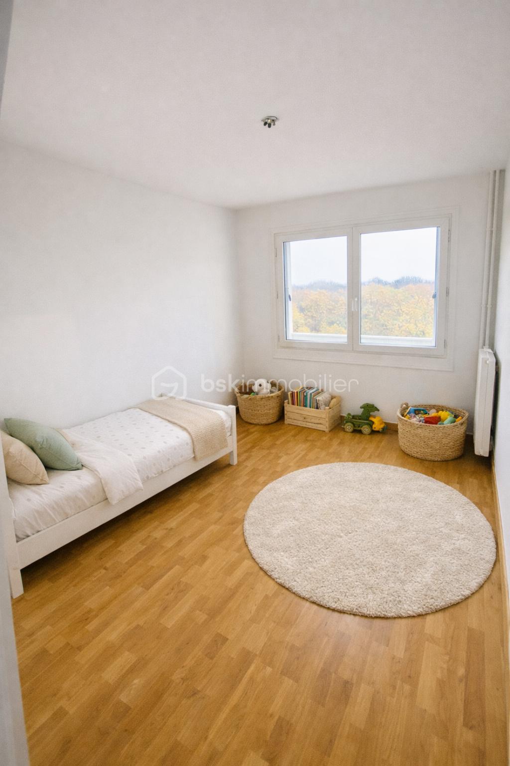 Appartement de 80,89 m² - Chambre d'enfant lumineuse et accueillante.png