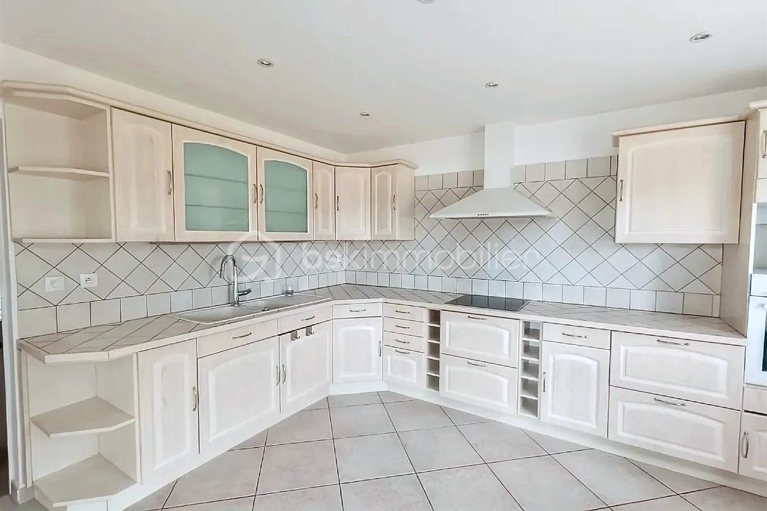 Maison de 140 m² - hoqi-d535751dffd94f5eb49d64b3d8531fee (1).jpg