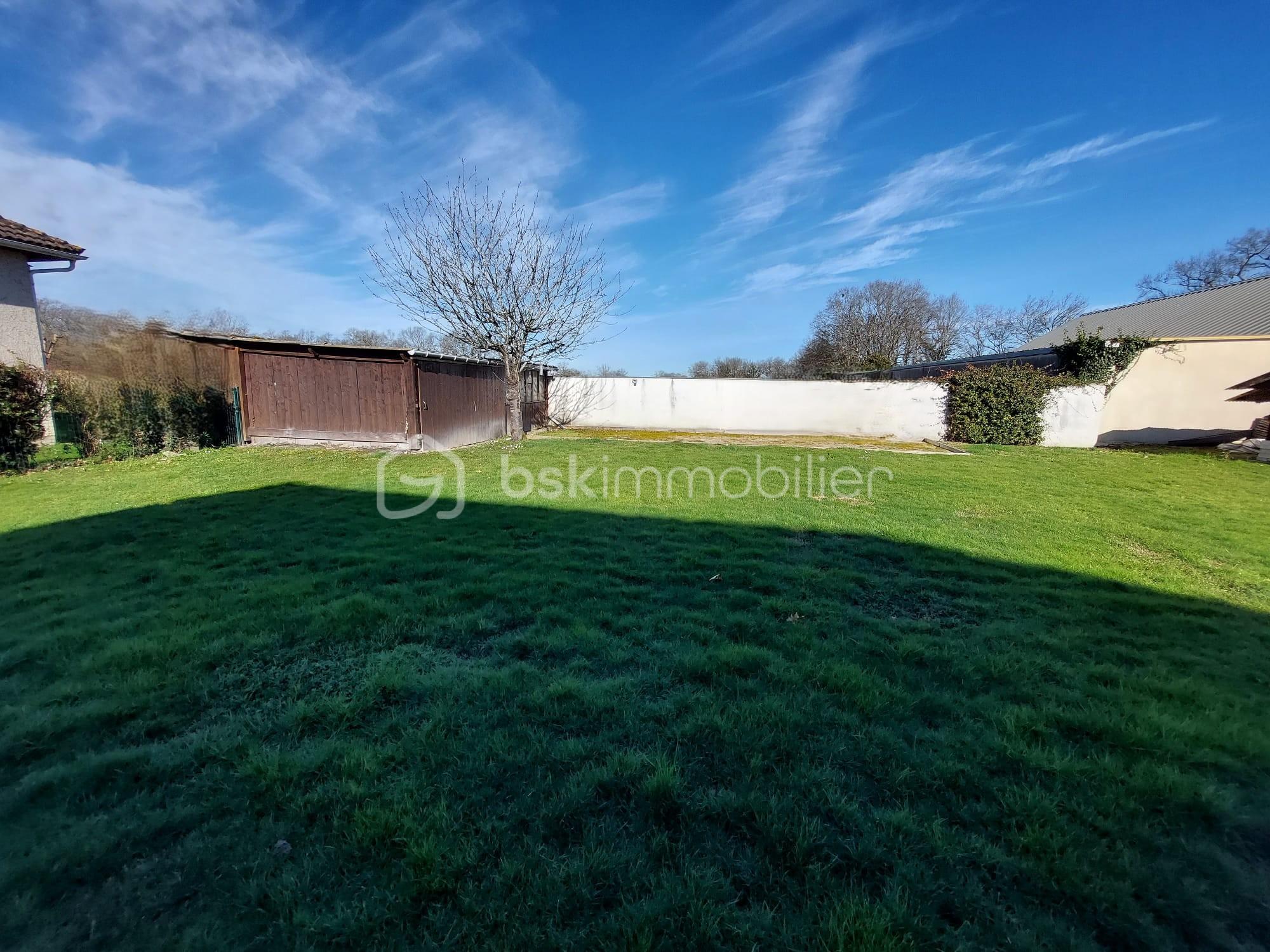 Maison traditionnelle de 140 m² - jardin.jpeg