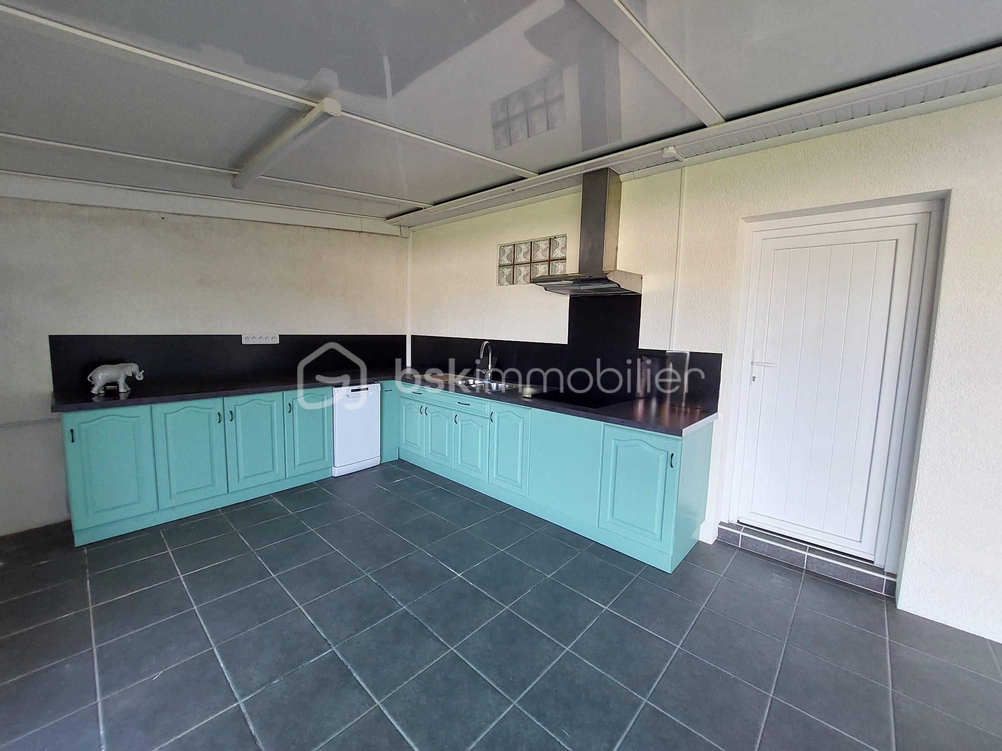 Maison traditionnelle de 140 m² - cuisine veranda.jpeg