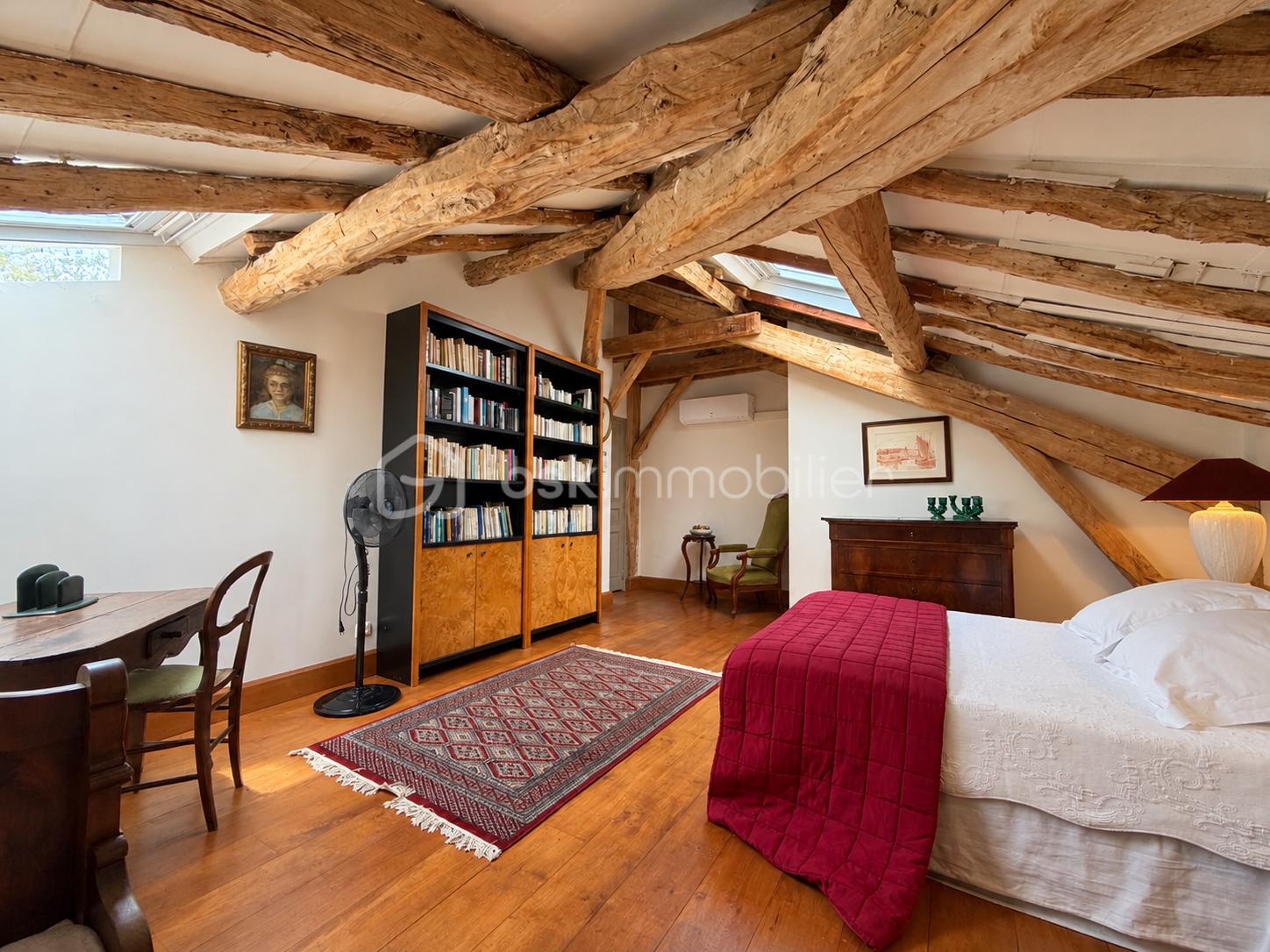 Chambre mansardée rustique et chaleureuse.png