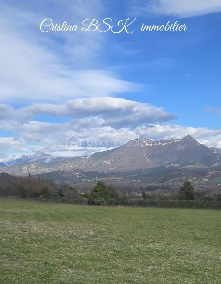 Terrain de 1 000 m² - photo pub signée terrain.jpg