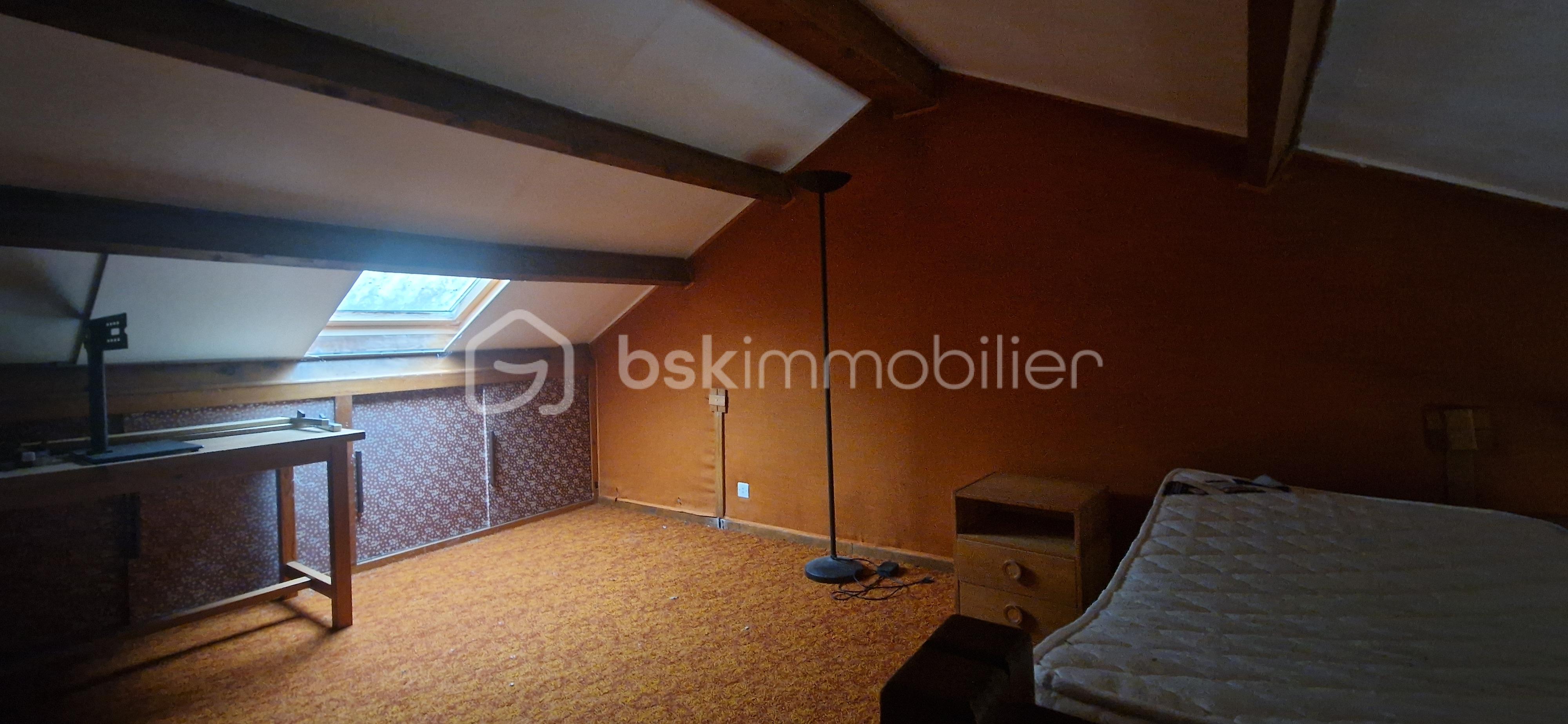 Maison de 99 m² - chambre en mezanine.jpg