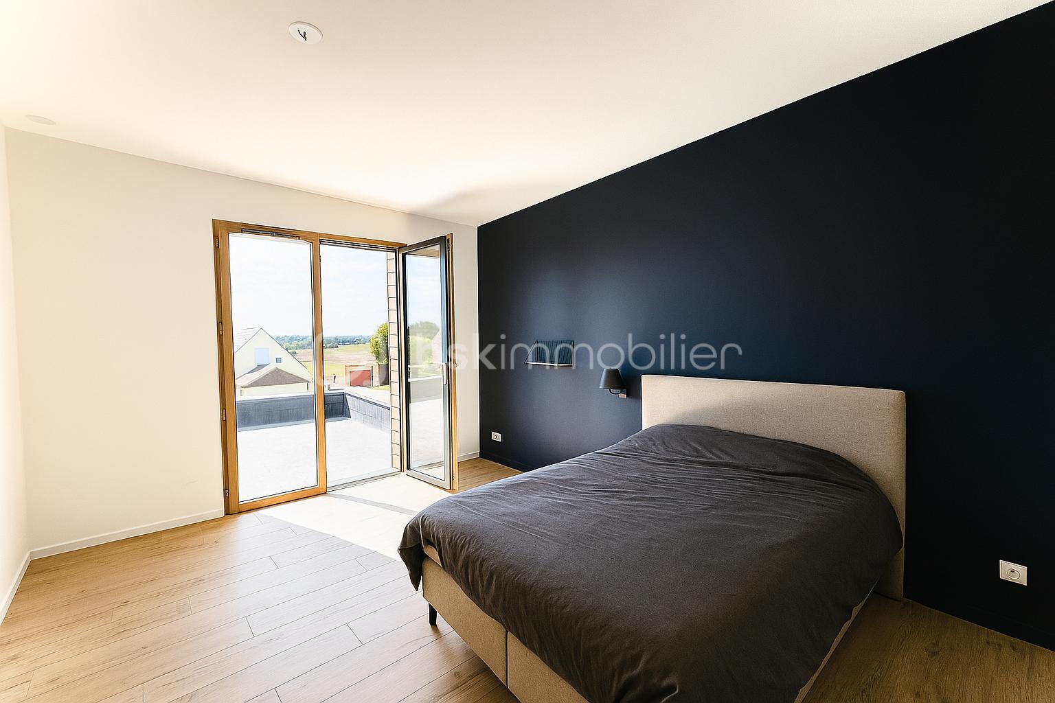 Maison contemporaine de 124 m² - chambre bleu nuit.png