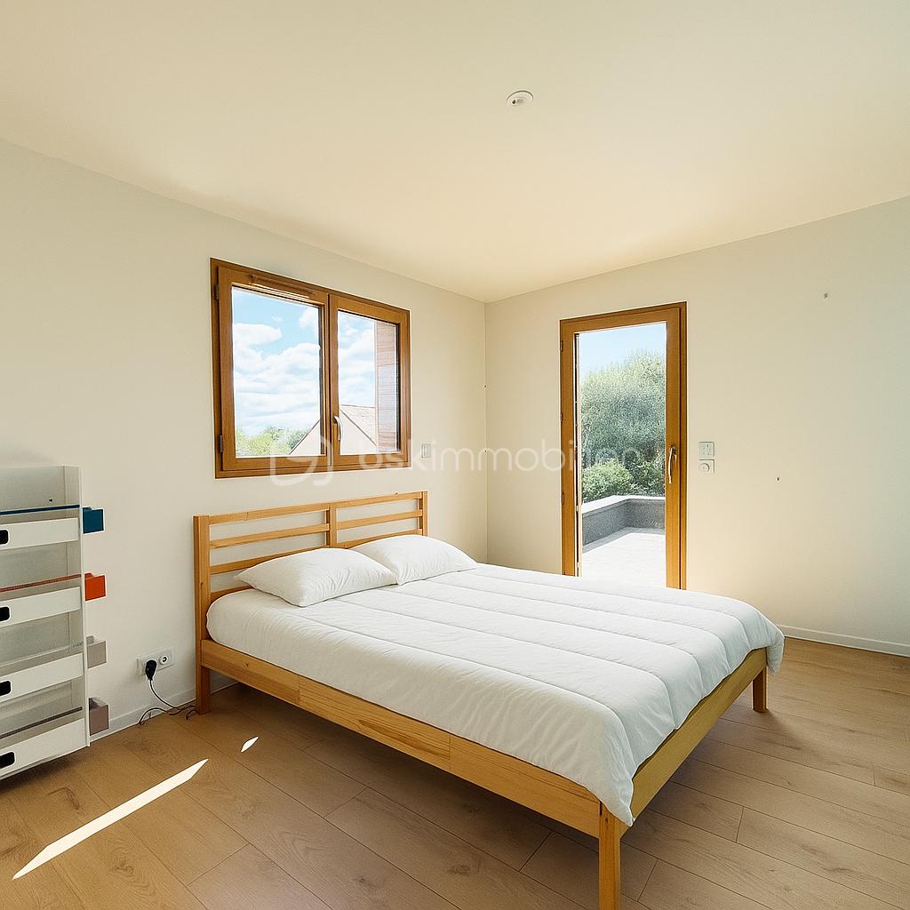 Maison contemporaine de 124 m² - chapmbre bleu turquoise.png