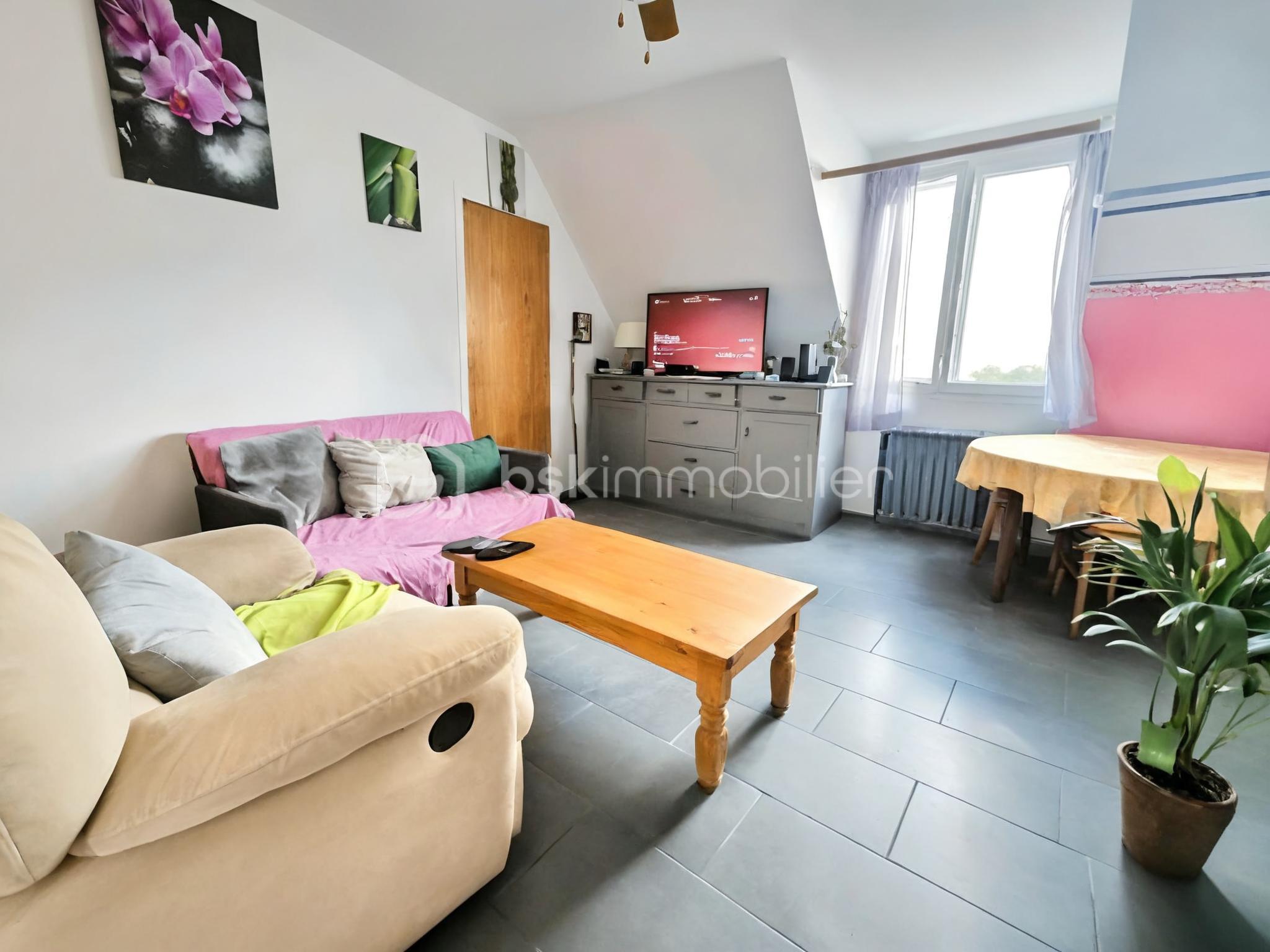 Appartement de 34 m² - SALON RANGE LUMIERE HD.jpg
