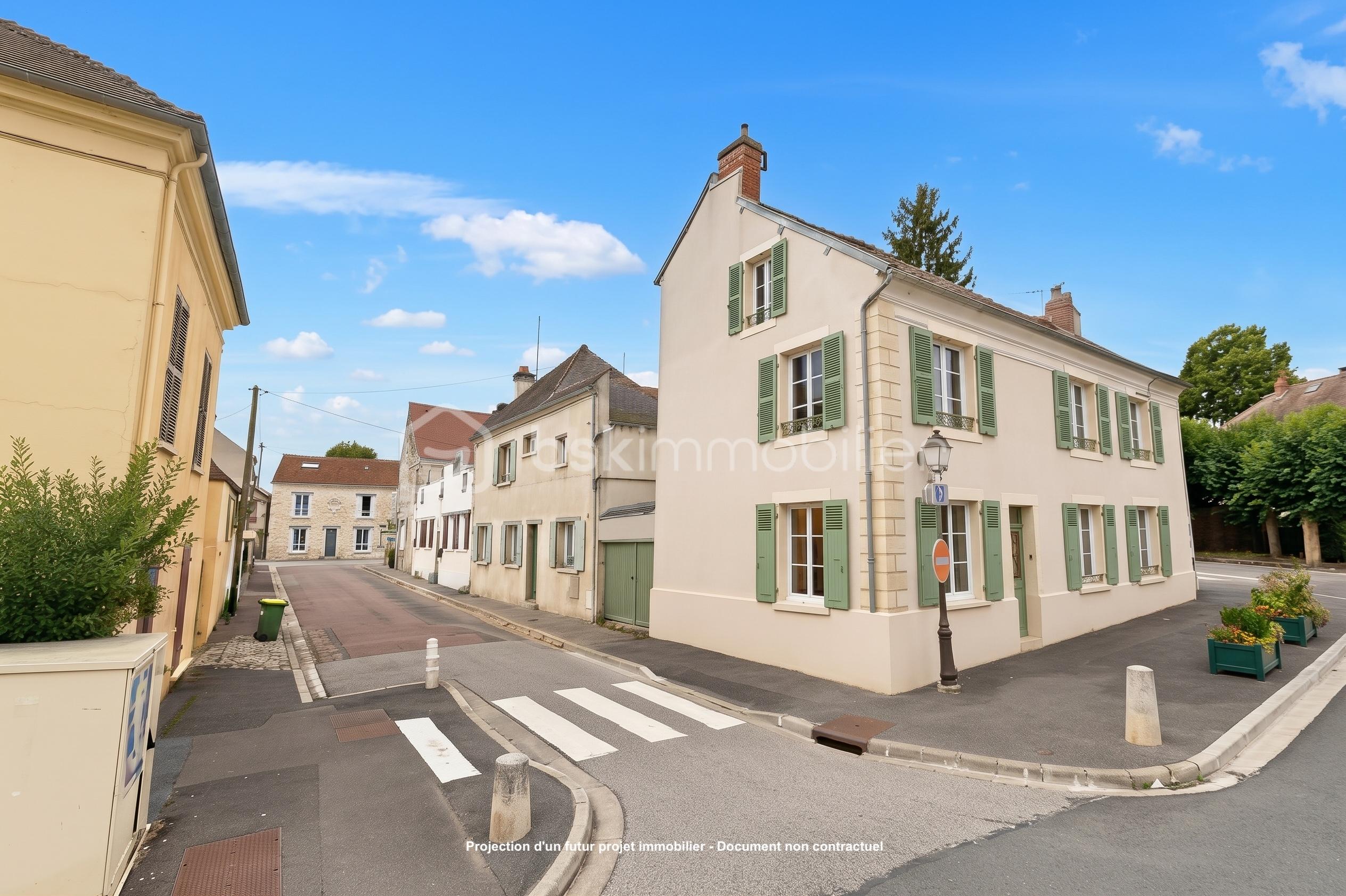 Vue angle de rue et place coeur village Neauphle-Le-Vieux.jpeg