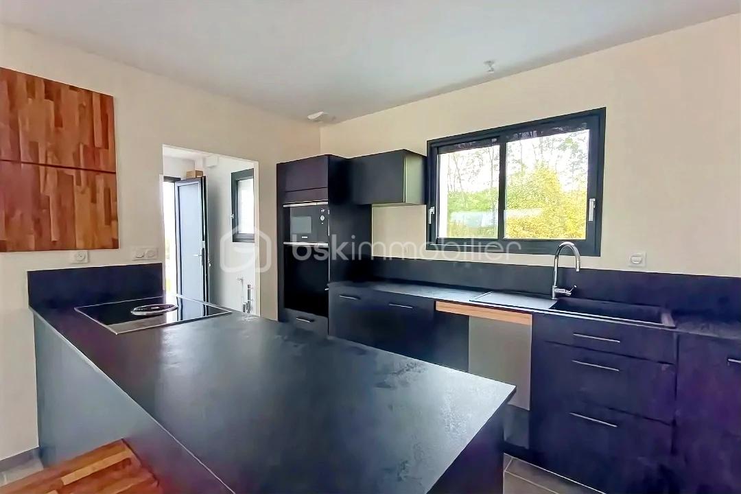 Maison de 100 m² - hoqi-613415a641a5456290eecbbee64d15b3.jpg