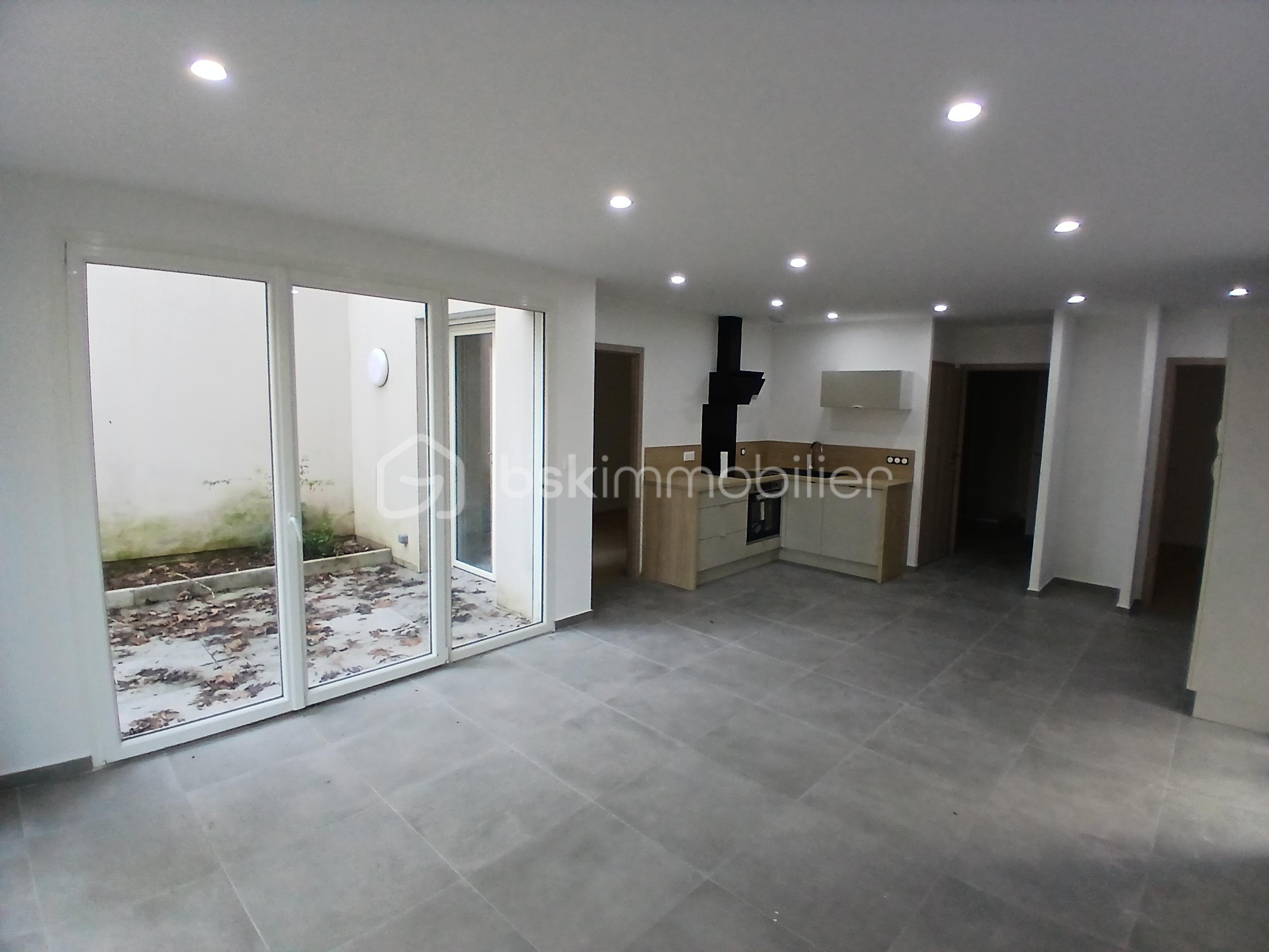 Appartement de 61 m² - REZ DE JARDIN TILLEROYES 103.jpg