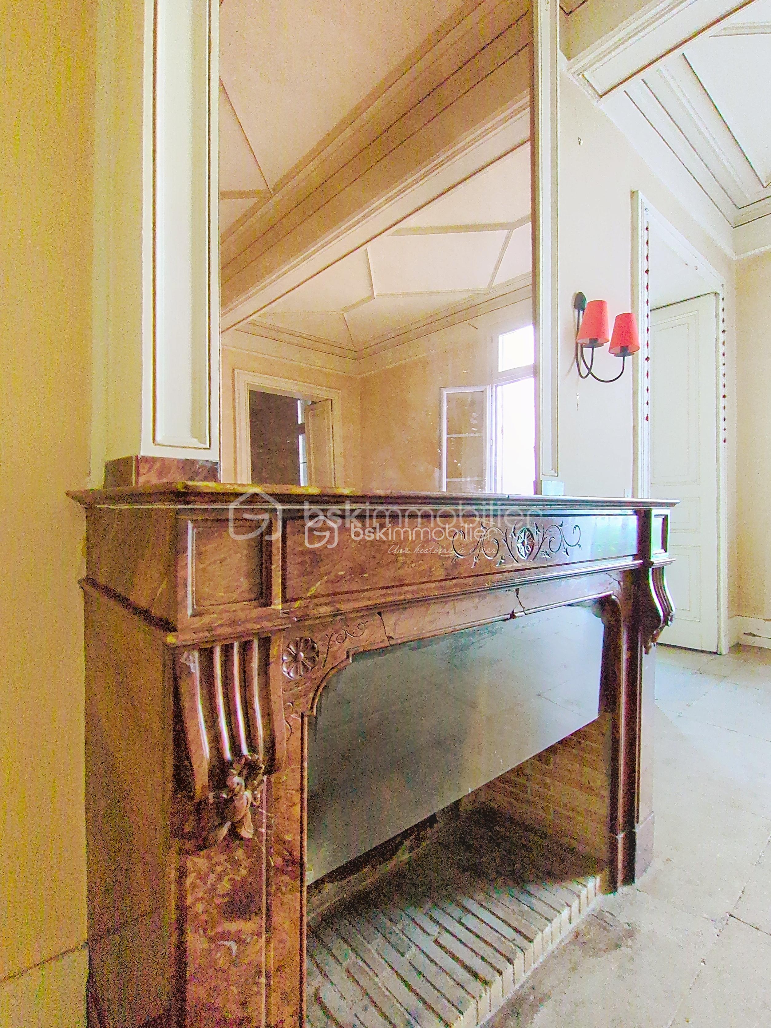 Appartement de 154,82 m² - cheminée sejour.jpeg