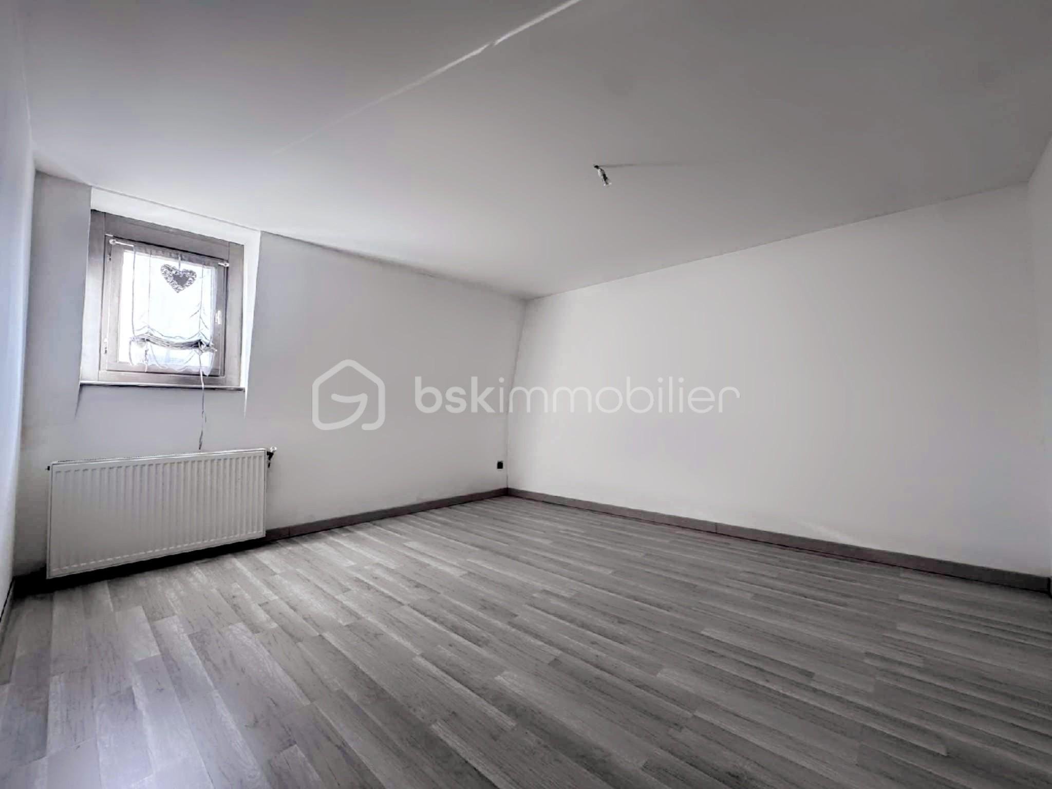 Maison de ville de 107 m² - chambre 1.jpg