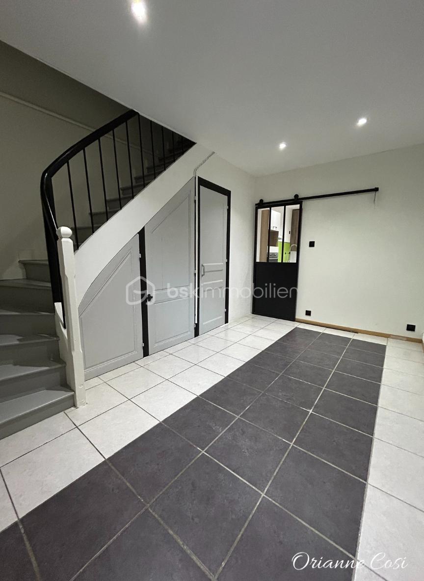 Maison de ville de 78 m² - Salon logo.png