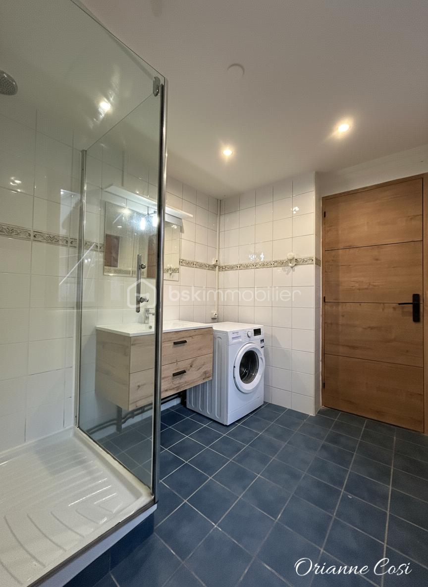 Maison de ville de 78 m² - Salle de bain logo.png