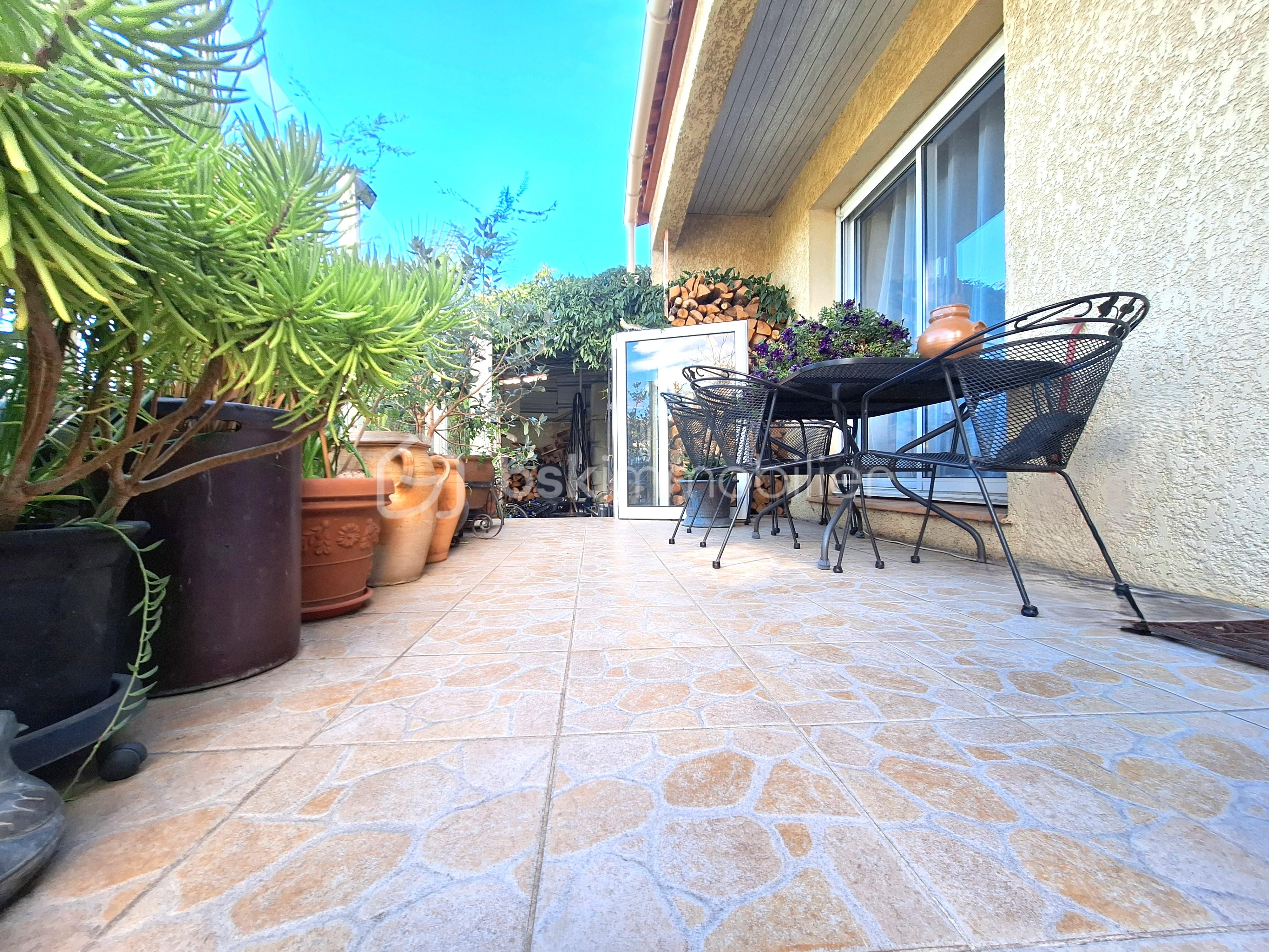 Maison de 90 m² - Terrasse avant ok.jpg